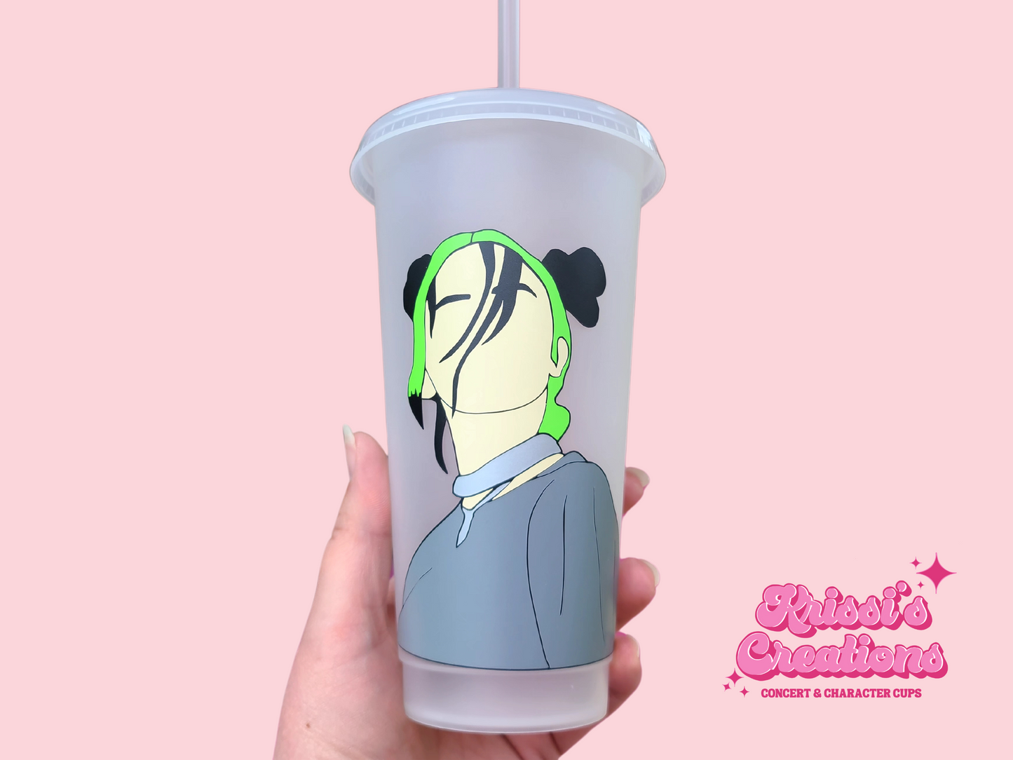 A frosted tumbler with a drawing of Billie Eilish. This is a 24oz cup which is perfect for fans of Billie Eilish. Made and sold by Krissi's Creations.