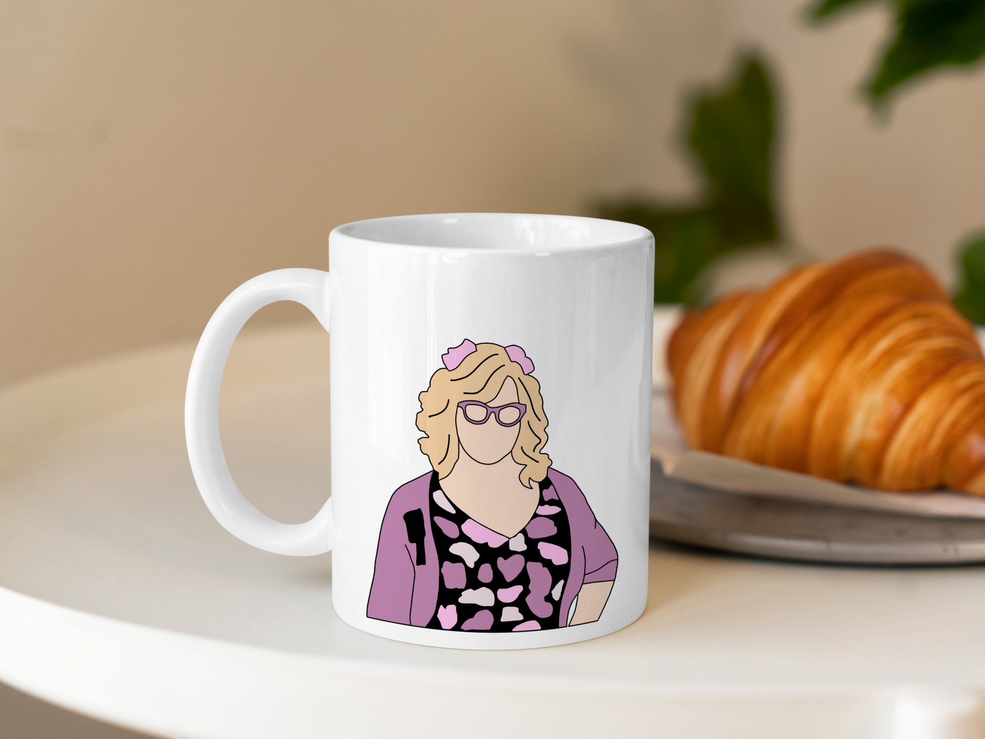 A white ceramic mug with a drawing of Penelope Garcia from Criminal Minds on the front. This is a 10oz mug which is perfect for fans of Criminal Minds, particularly the character Penelope Garcia. Made and sold by Krissi's Creations.