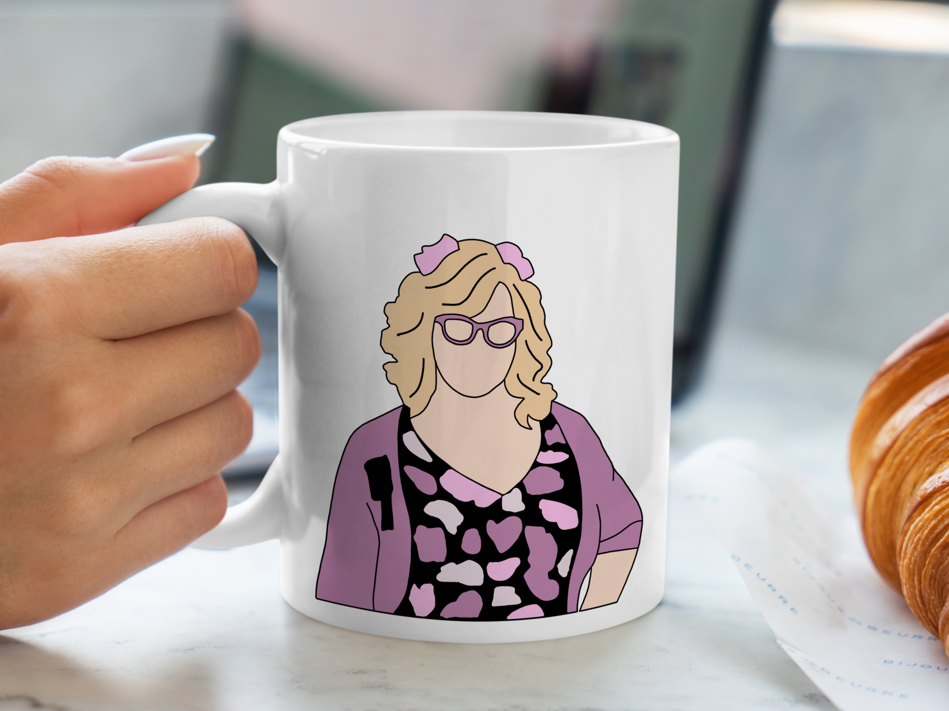 A white ceramic mug with a drawing of Penelope Garcia from Criminal Minds on the front. This is a 10oz mug which is perfect for fans of Criminal Minds, particularly the character Penelope Garcia. Made and sold by Krissi's Creations.