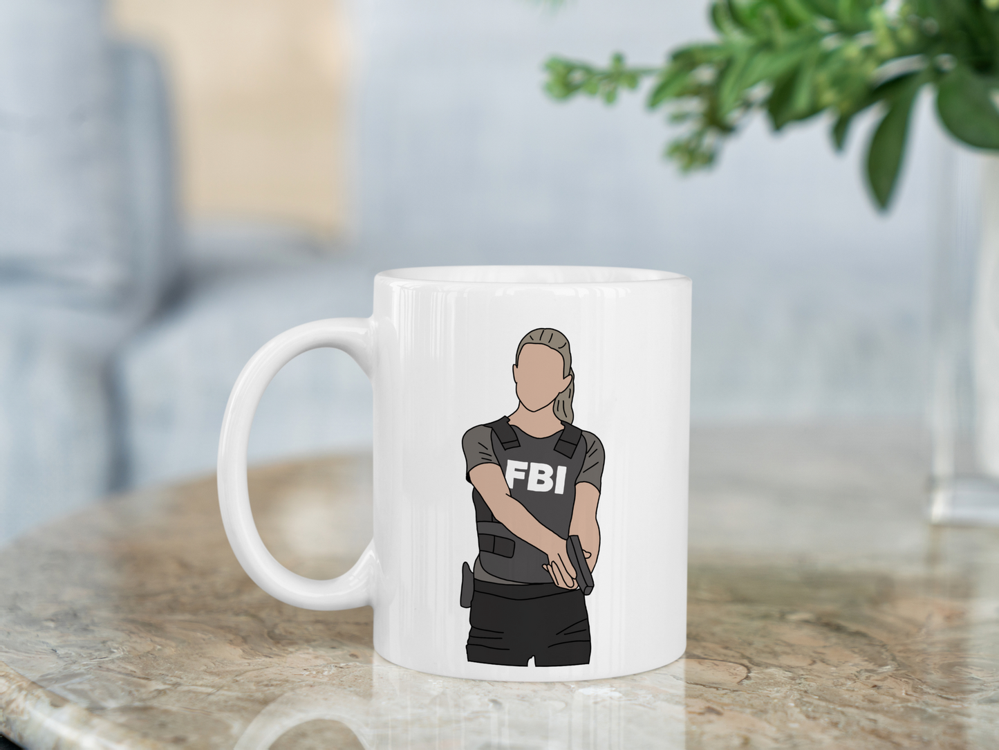 A white ceramic mug with a drawing of Jennifer Jareau from Criminal Minds on the front. This is a 10oz mug which is perfect for fans of Criminal Minds, particularly the character Jennifer Jareau. Made and sold by Krissi's Creations.