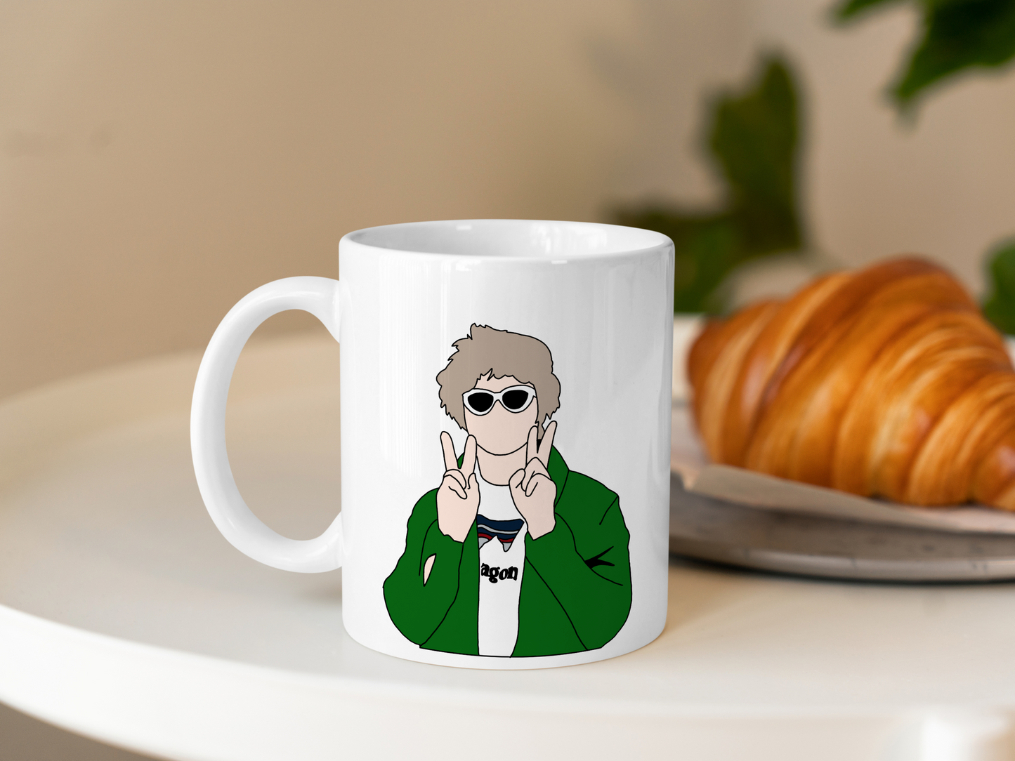 A white ceramic mug with a drawing of Lewis Capaldi on the front. This is a 10oz mug which is perfect for fans of Lewis Capaldi Concerts. Made and sold by Krissi's Creations.