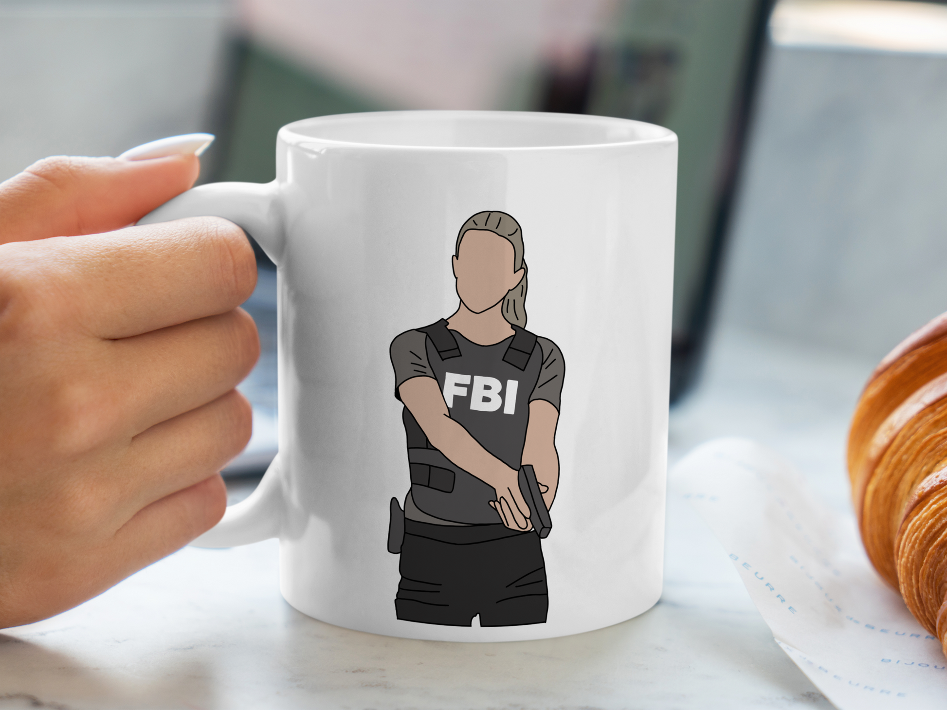 A white ceramic mug with a drawing of Jennifer Jareau from Criminal Minds on the front. This is a 10oz mug which is perfect for fans of Criminal Minds, particularly the character Jennifer Jareau. Made and sold by Krissi's Creations.