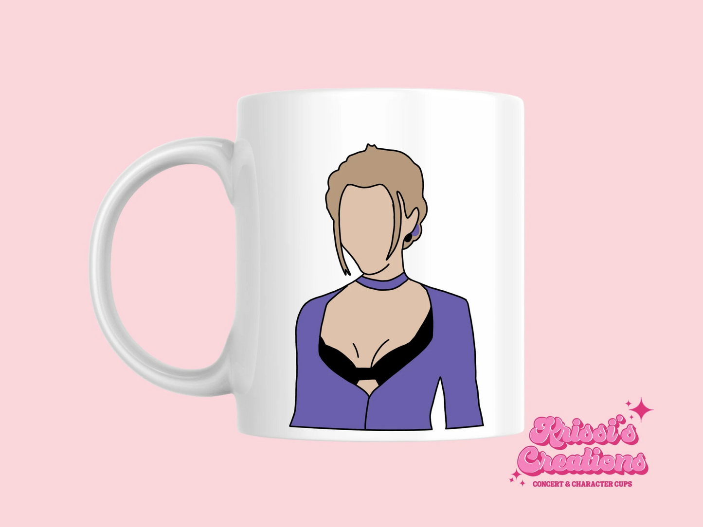 A white ceramic mug with a drawing of Phoebe Buffay from Friends on the front. This is a 10oz mug which is perfect for fans of Friends, particularly the character Phoebe. Made and sold by Krissi's Creations.