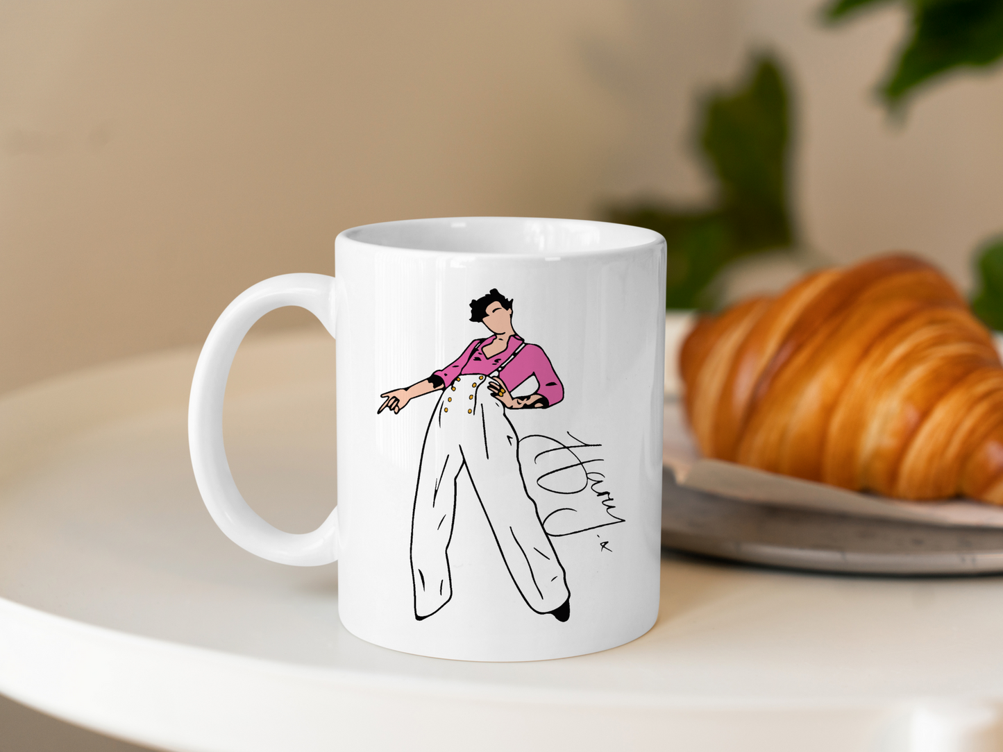 A white ceramic mug with a drawing of Harry Styles Watermelon Sugar Hqrrys House Outfit on the front. This is a 10oz mug which is perfect for fans of Harry Styles Love on Tour Concert. Made and sold by Krissi's Creations.