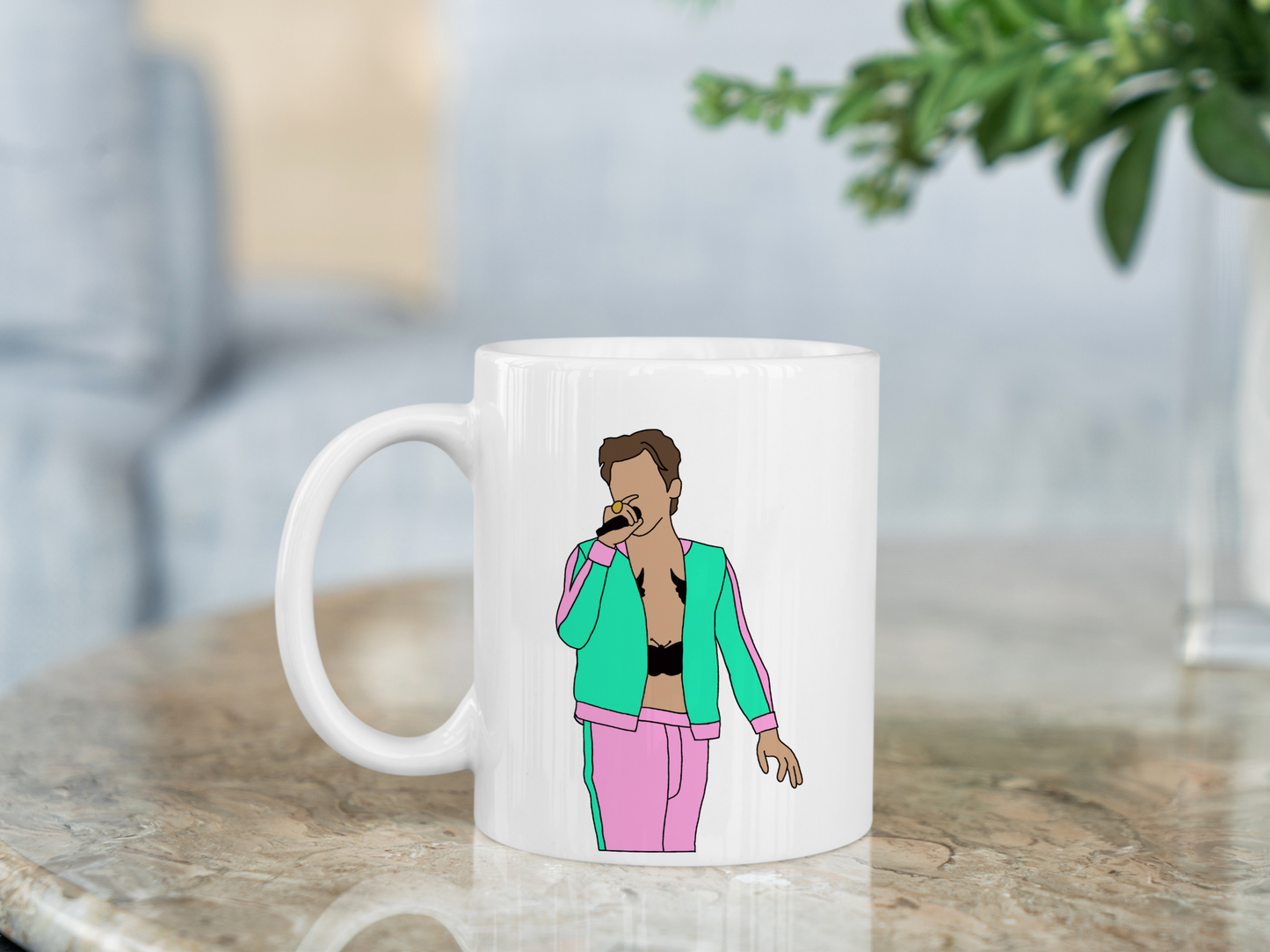 A white ceramic mug with a drawing of Harry Styles Coventry Night 2 Love On Tour Outfit on the front. This is a 10oz mug which is perfect for fans of Harry Styles Love on Tour Concert. Made and sold by Krissi's Creations.