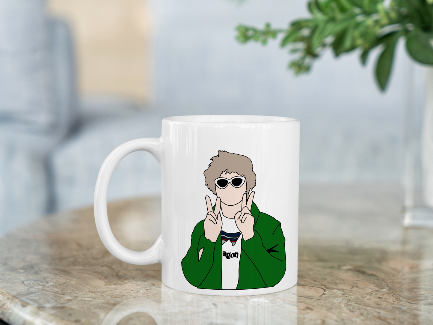 A white ceramic mug with a drawing of Lewis Capaldi on the front. This is a 10oz mug which is perfect for fans of Lewis Capaldi Concerts. Made and sold by Krissi's Creations.