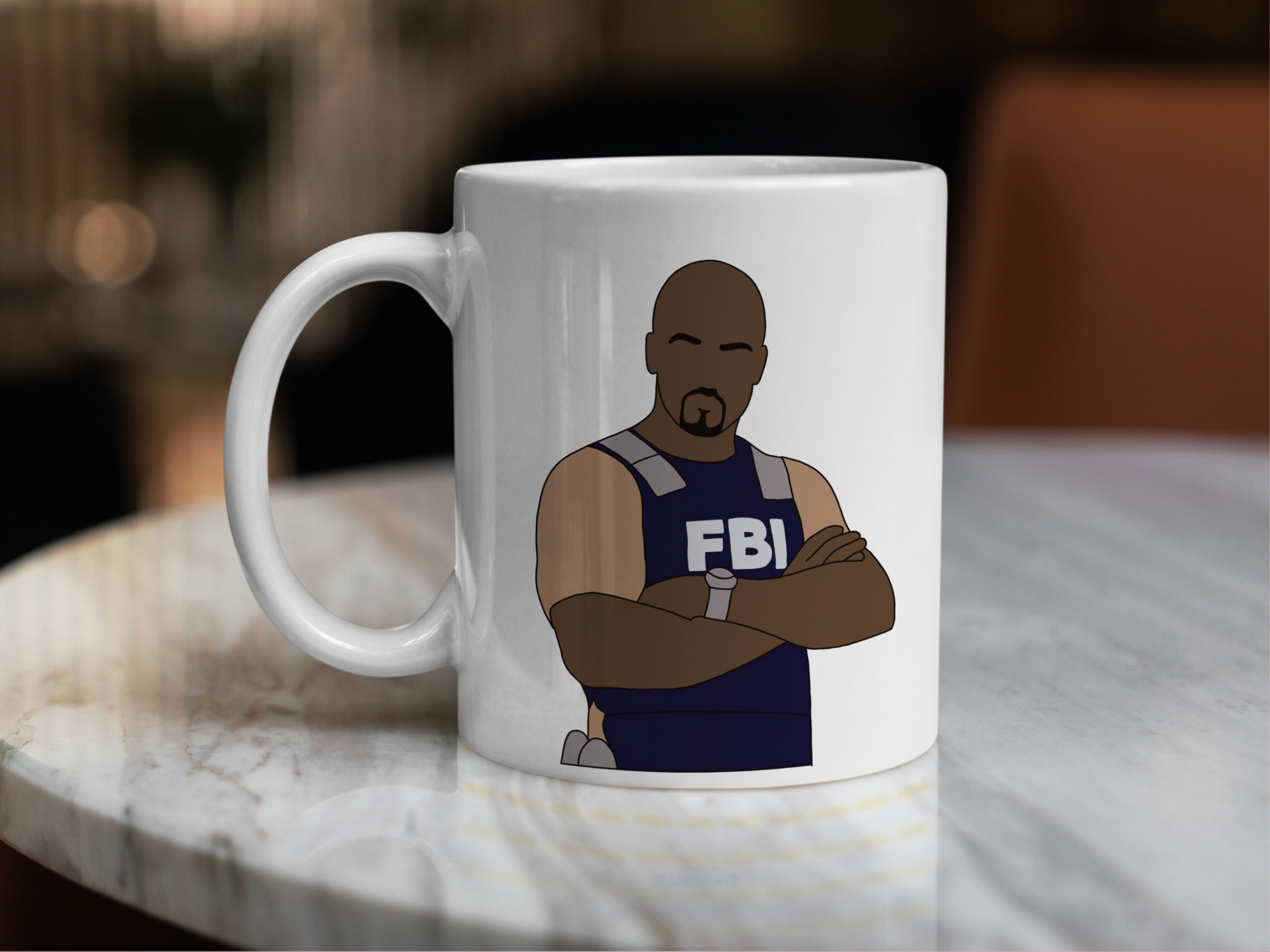 A white ceramic mug with a drawing of Derek Morgan from Criminal Minds on the front. This is a 10oz mug which is perfect for fans of Criminal Minds, particularly the character Derek Morgan. Made and sold by Krissi's Creations.