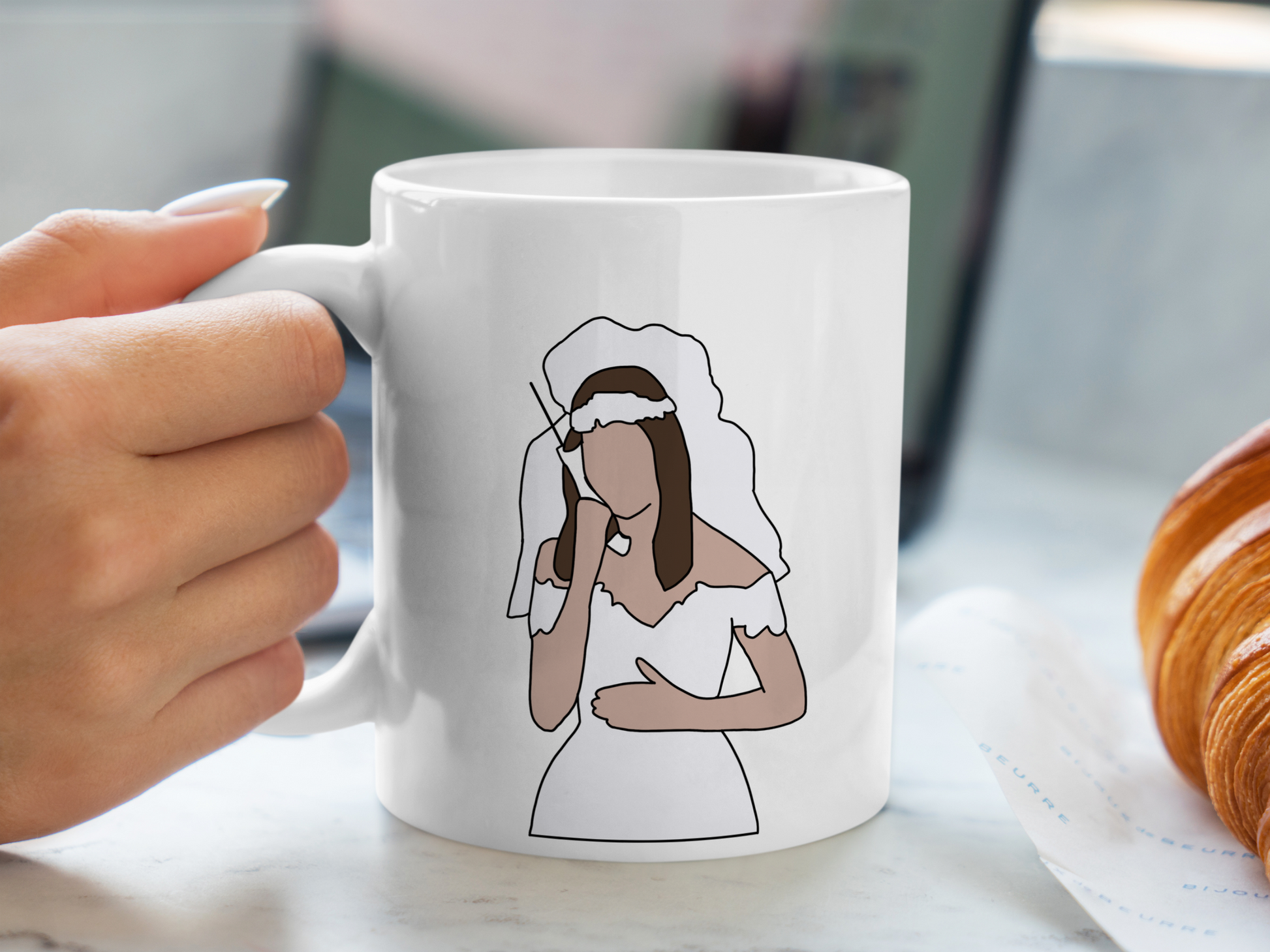 A white ceramic mug with a drawing of Rachel Green from Friends on the front. This is a 10oz mug which is perfect for fans of Friends, particularly the character Rachel. Made and sold by Krissi's Creations.