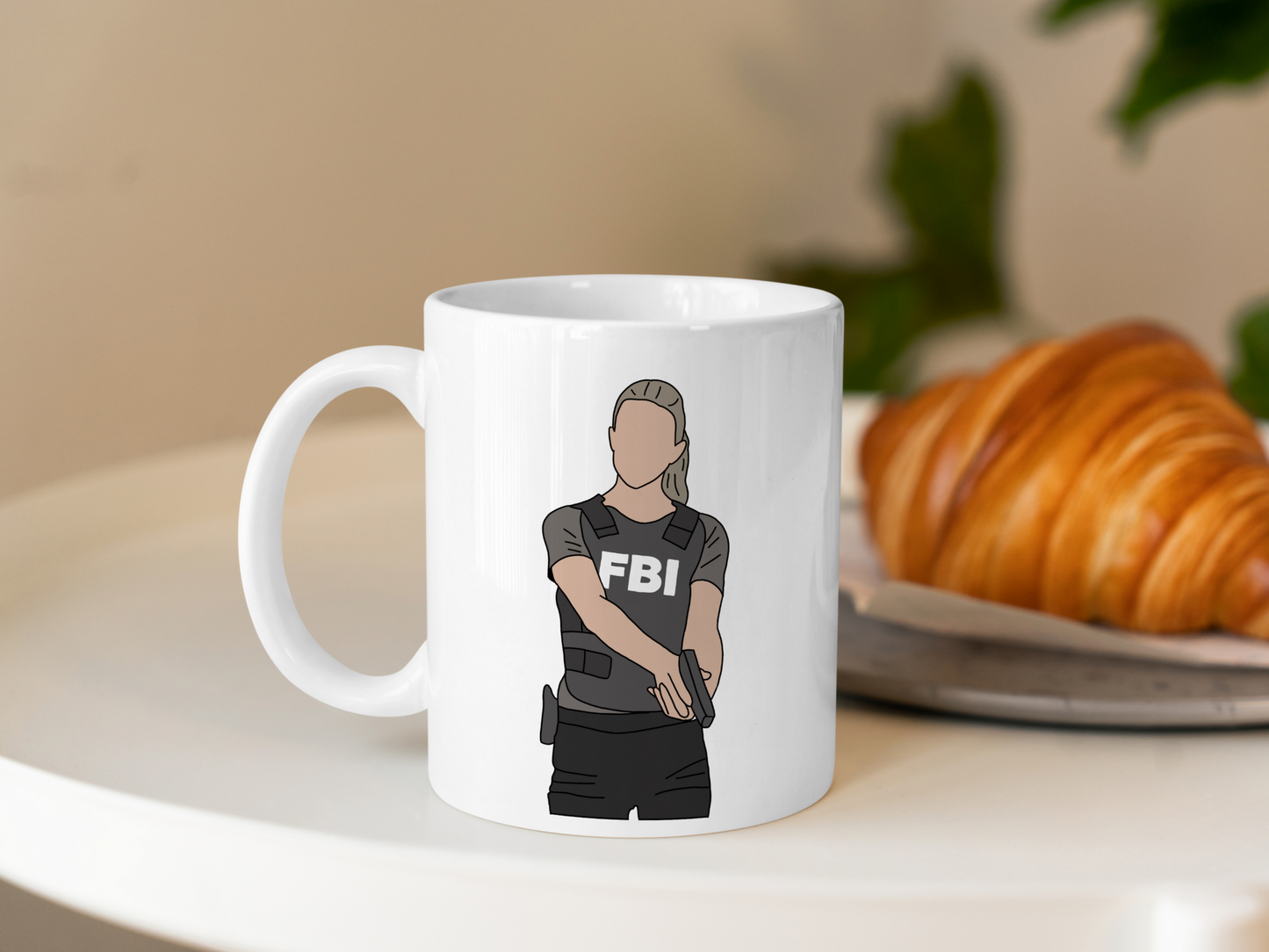 A white ceramic mug with a drawing of Jennifer Jareau from Criminal Minds on the front. This is a 10oz mug which is perfect for fans of Criminal Minds, particularly the character Jennifer Jareau. Made and sold by Krissi's Creations.