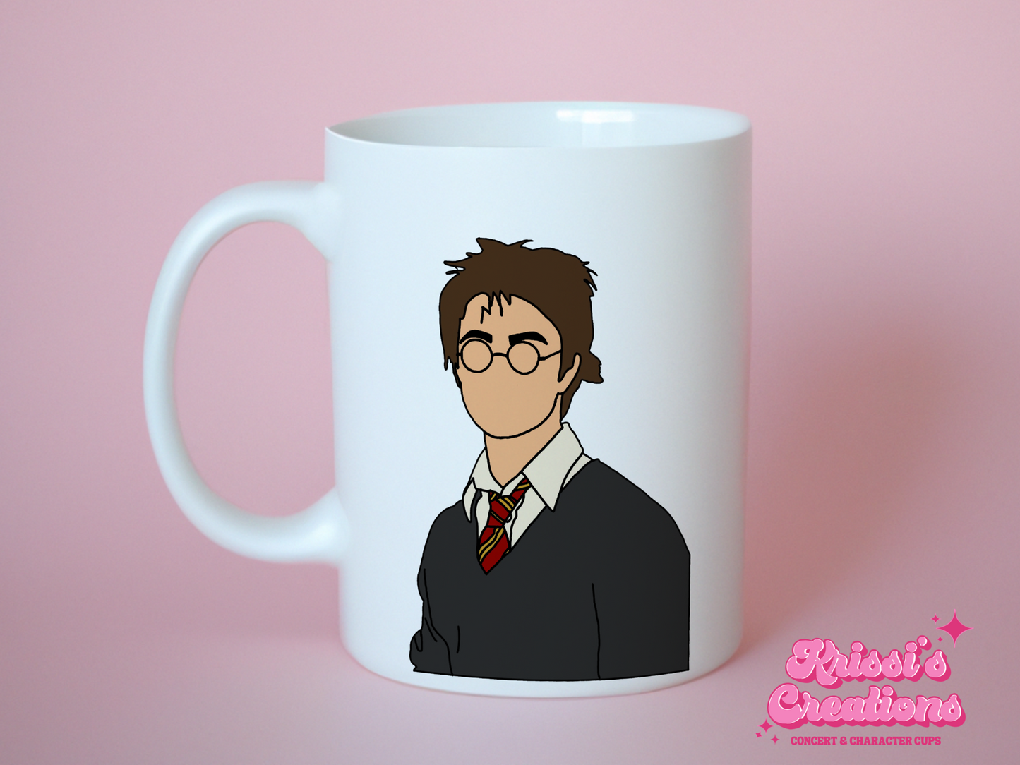 A white ceramic mug with the Characters on Harry Potter on the front. This is a 10oz mug which is perfect for fans of the Harry Potter Movies. Made and sold by Krissi's Creations. 