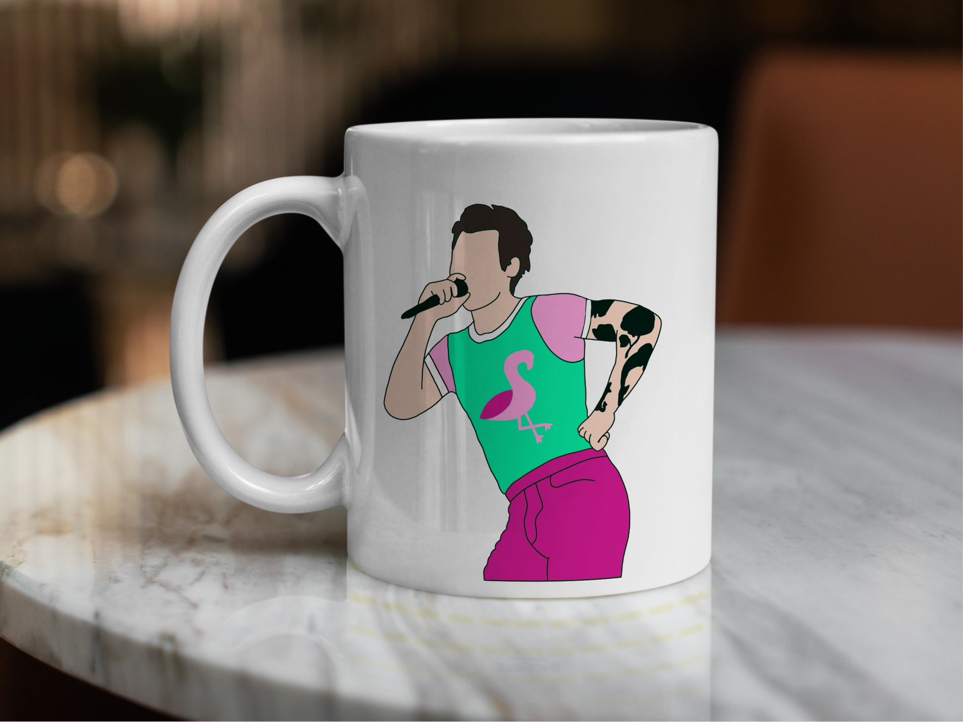 A white ceramic mug with a drawing of Harry Styles Cardiff Night 2 Outfit on the front. This is a 10oz mug which is perfect for fans of Harry Styles Love on Tour Concert. Made and sold by Krissi's Creations.