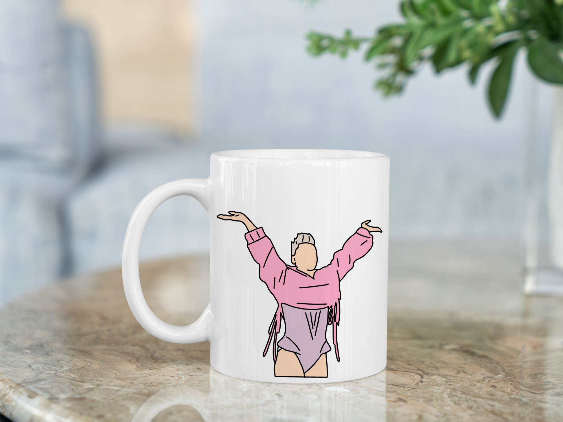 A white ceramic mug with a drawing of P!NK from her Summer Carnival 2024 on the front. This is a 10oz mug which is perfect for fans of Pink, particularly the Concert. Made and sold by Krissi's Creations.