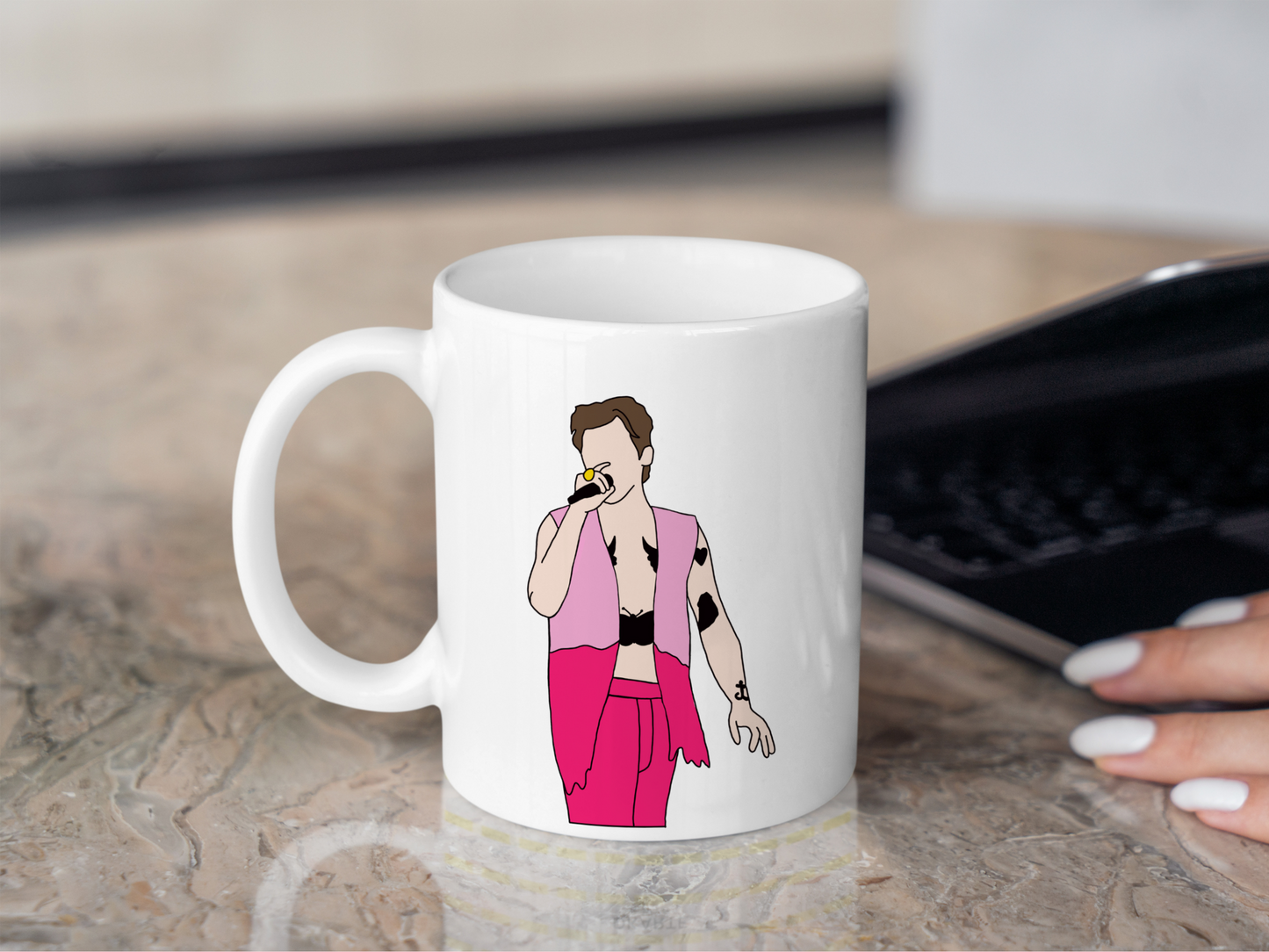 A white ceramic mug with a drawing of Harry Styles Edinburgh Night 2 Love On Tour Outfit on the front. This is a 10oz mug which is perfect for fans of Harry Styles Love on Tour Concert. Made and sold by Krissi's Creations.