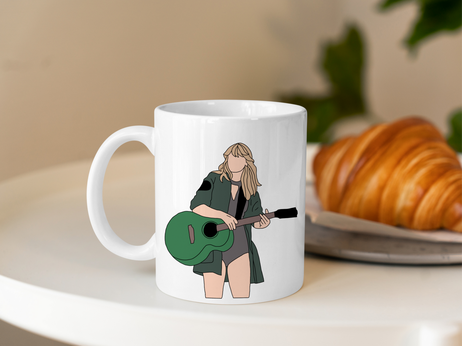 A white ceramic mug with a drawing of Taylor Swift from her Reputation Era on the front. This is a 10oz mug which is perfect for fans of Era's Tour, particularly the Reputation Album. Made and sold by Krissi's Creations.