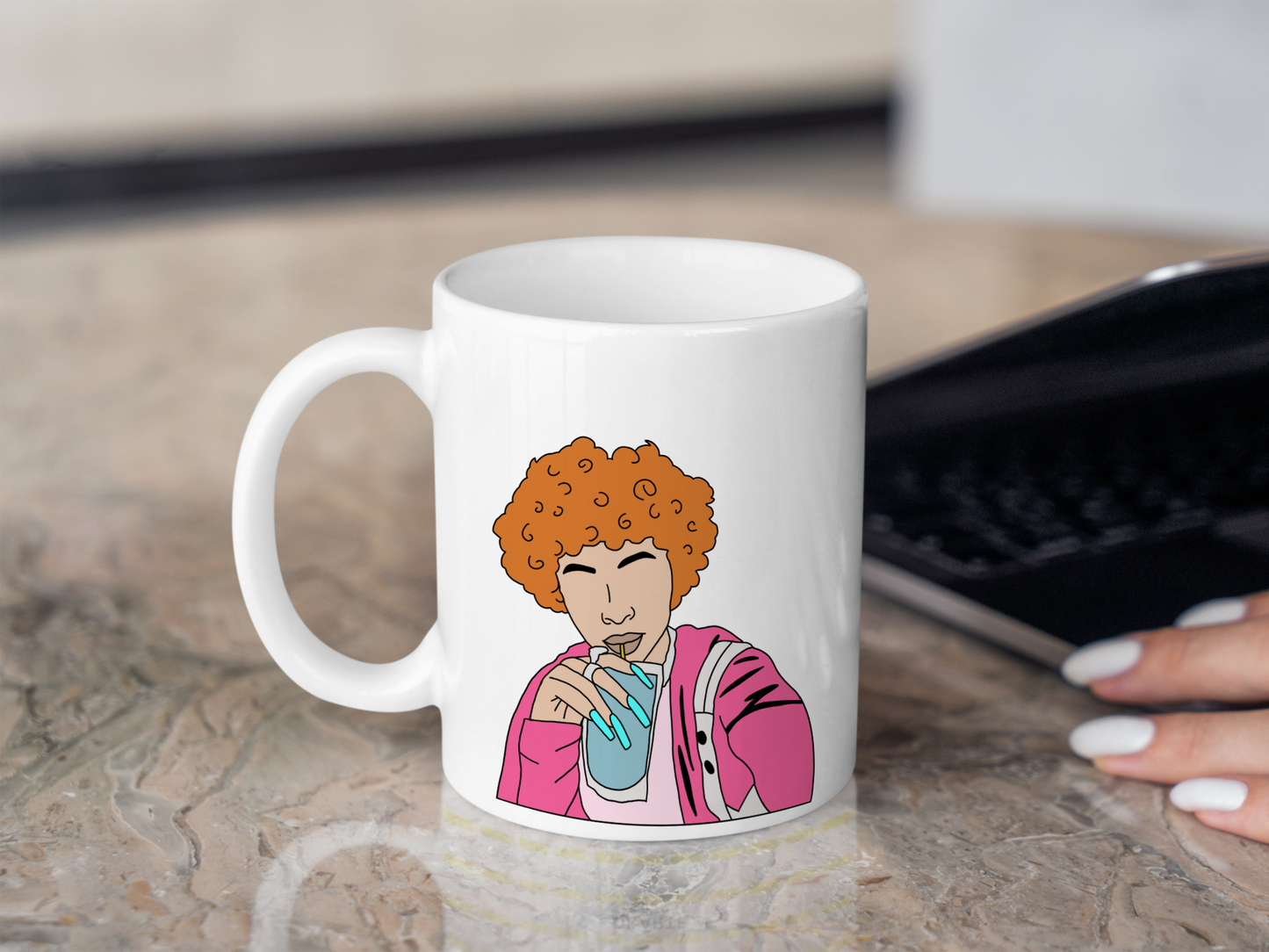 A white ceramic mug with a drawing of Ice Spice on the front. This is a 10oz mug which is perfect for fans of Ice Spice. Made and sold by Krissi's Creations.