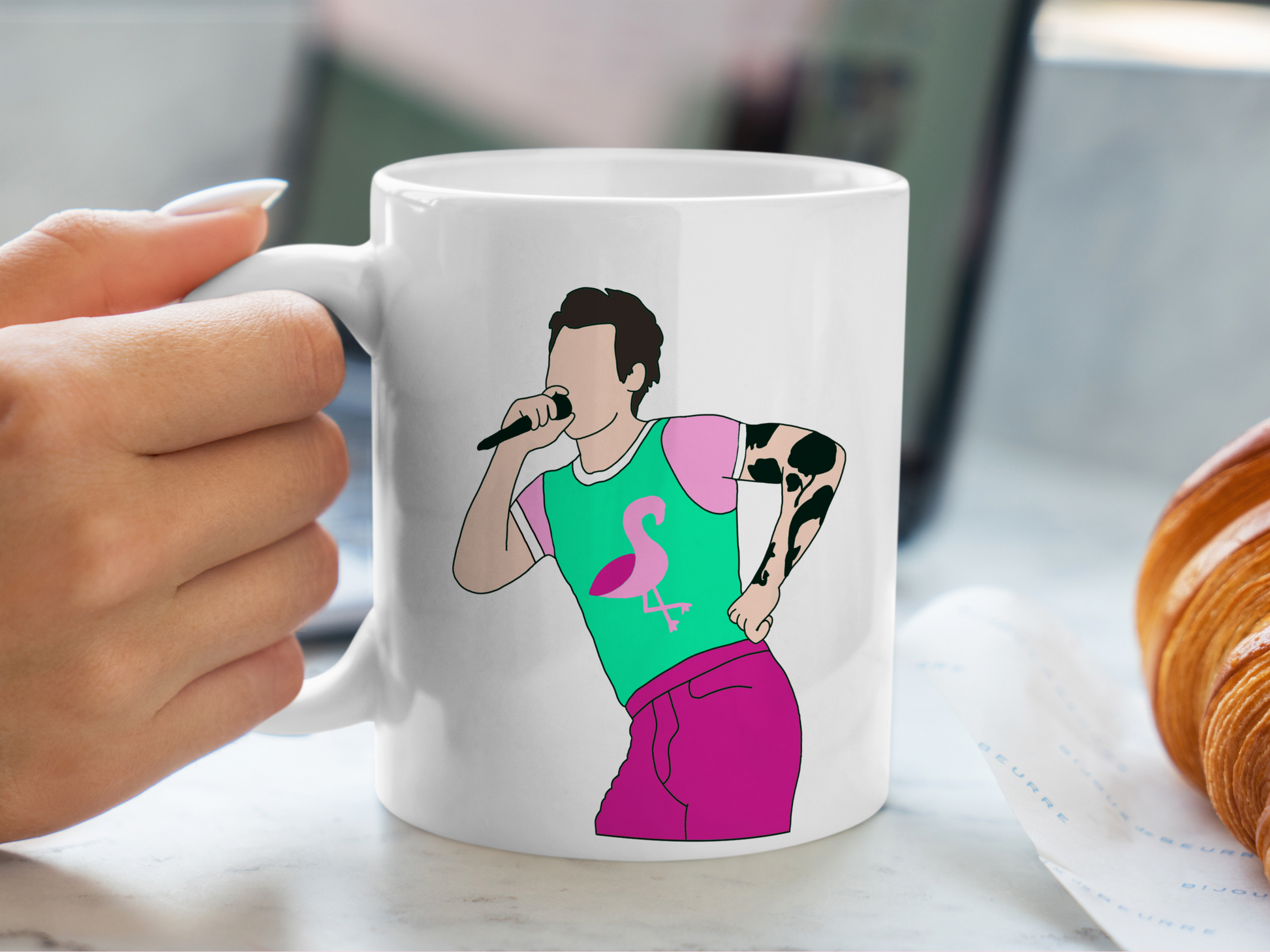 A white ceramic mug with a drawing of Harry Styles Cardiff Night 2 Outfit on the front. This is a 10oz mug which is perfect for fans of Harry Styles Love on Tour Concert. Made and sold by Krissi's Creations.