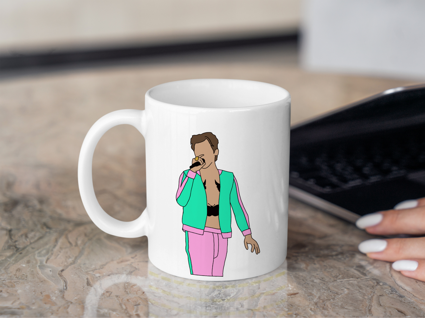 A white ceramic mug with a drawing of Harry Styles Coventry Night 2 Love On Tour Outfit on the front. This is a 10oz mug which is perfect for fans of Harry Styles Love on Tour Concert. Made and sold by Krissi's Creations.