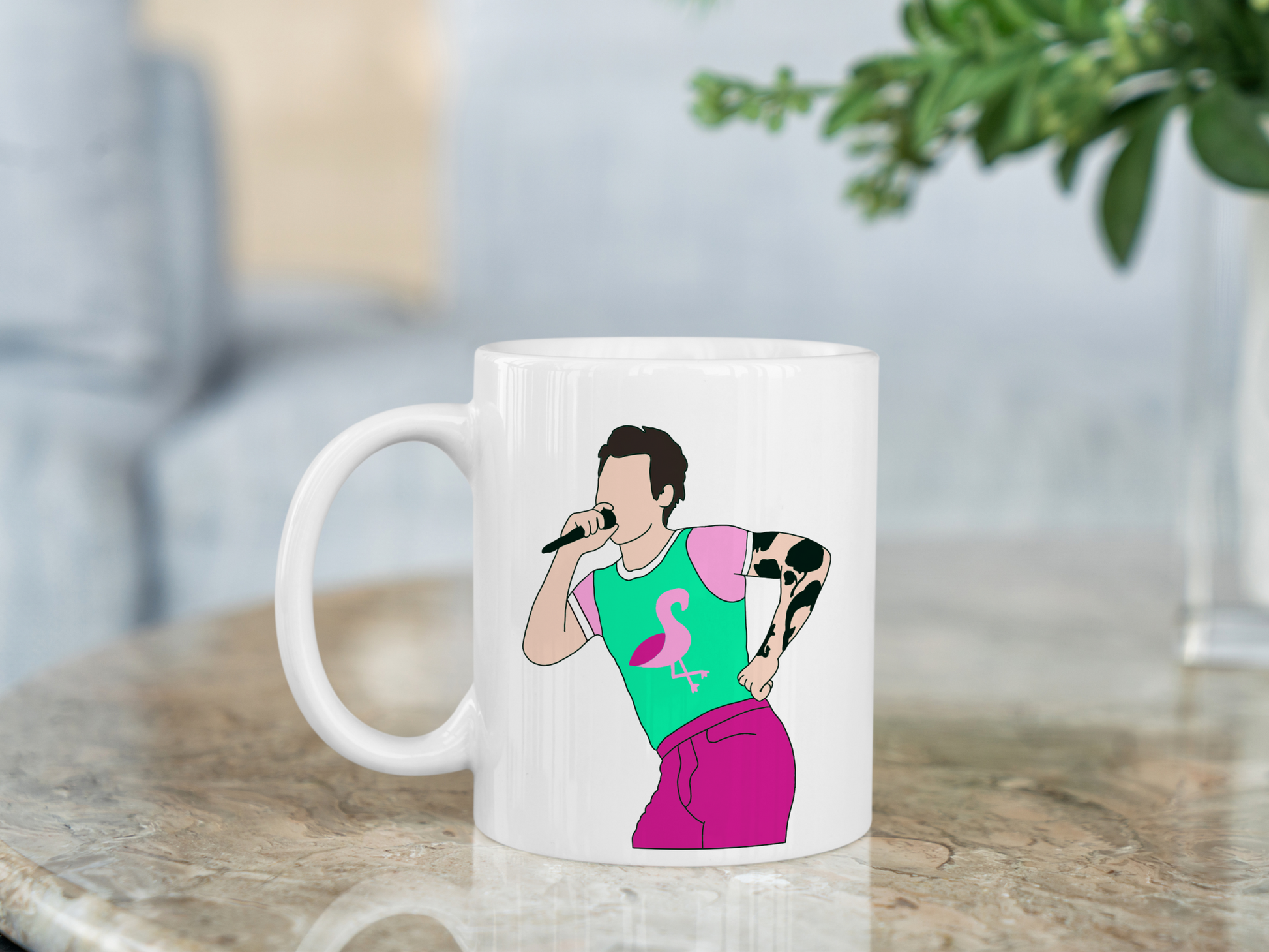 A white ceramic mug with a drawing of Harry Styles Cardiff Night 2 Outfit on the front. This is a 10oz mug which is perfect for fans of Harry Styles Love on Tour Concert. Made and sold by Krissi's Creations.