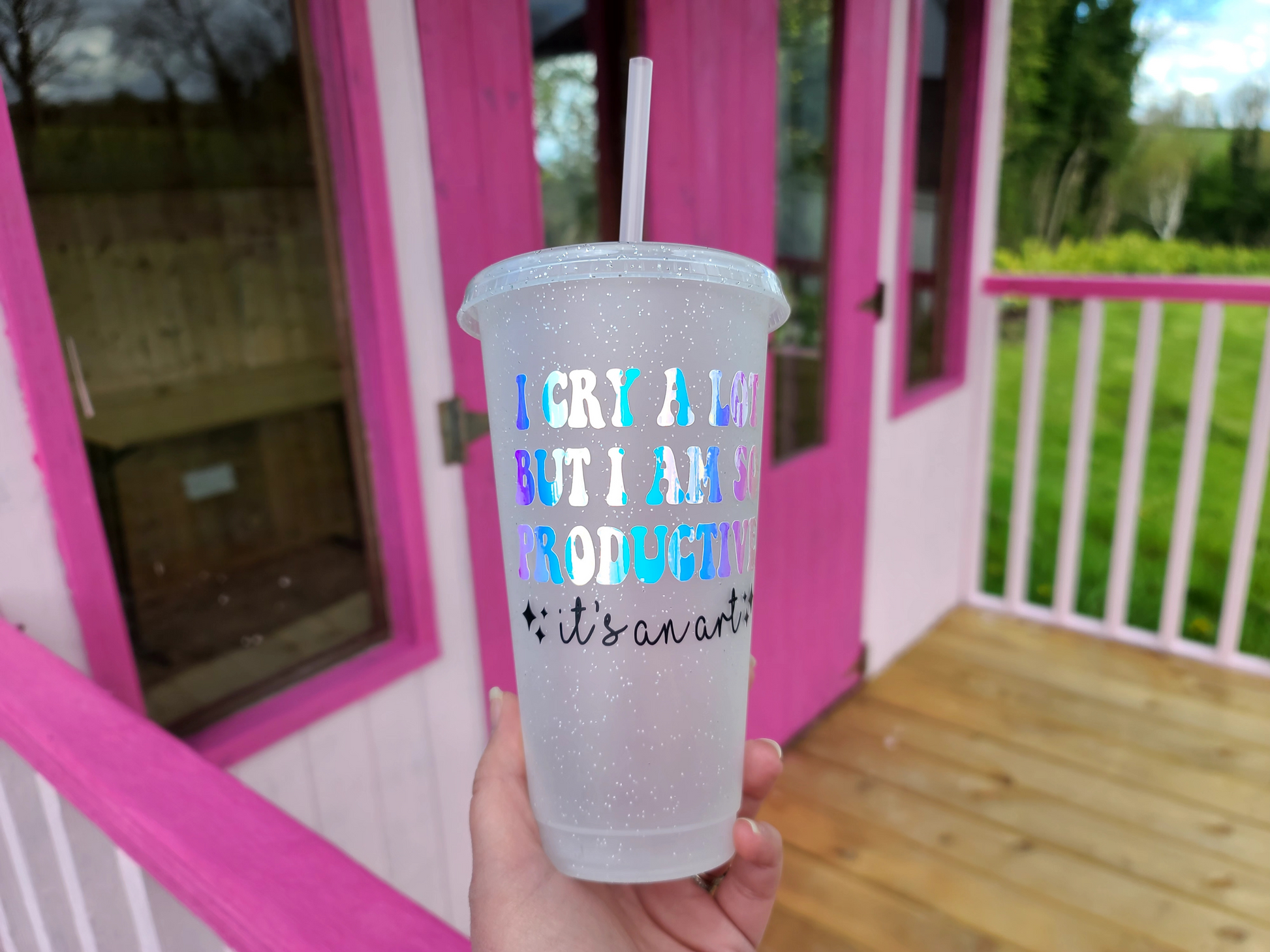 A Glitter tumbler with The Text I Cry A Lot But I am So Productive Lyrics From The Tortured Poets Department TTPD. This is a 24oz cup which is perfect for fans of Taylor Swift. Made and sold by Krissi's Creations.