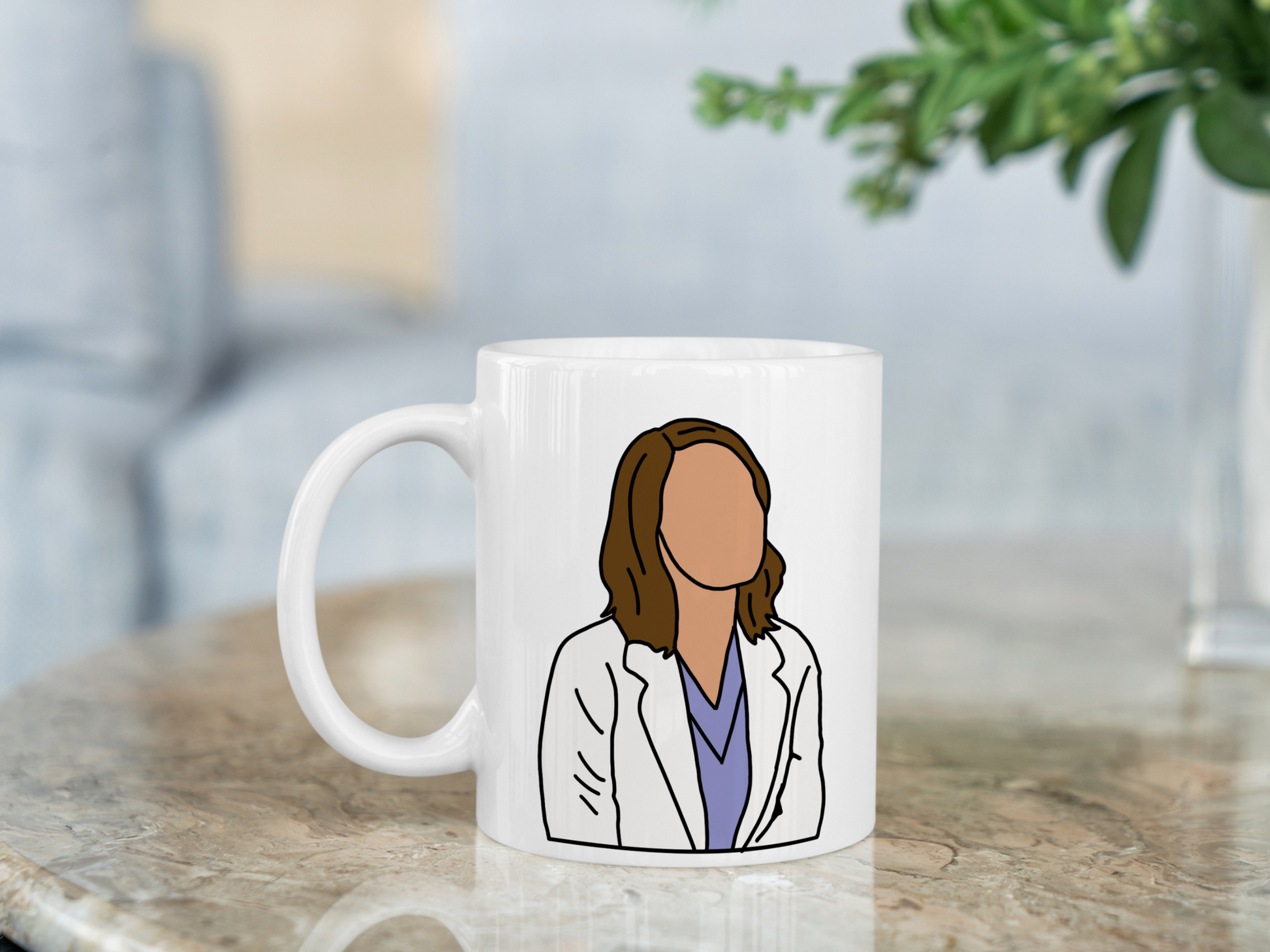 A white ceramic mug with a drawing of Jo Wilson from Grey's Anatomy on the front. This is a 10oz mug which is perfect for fans of Grey's Anatomy, particularly the character Jo Wilson. Made and sold by Krissi's Creations.