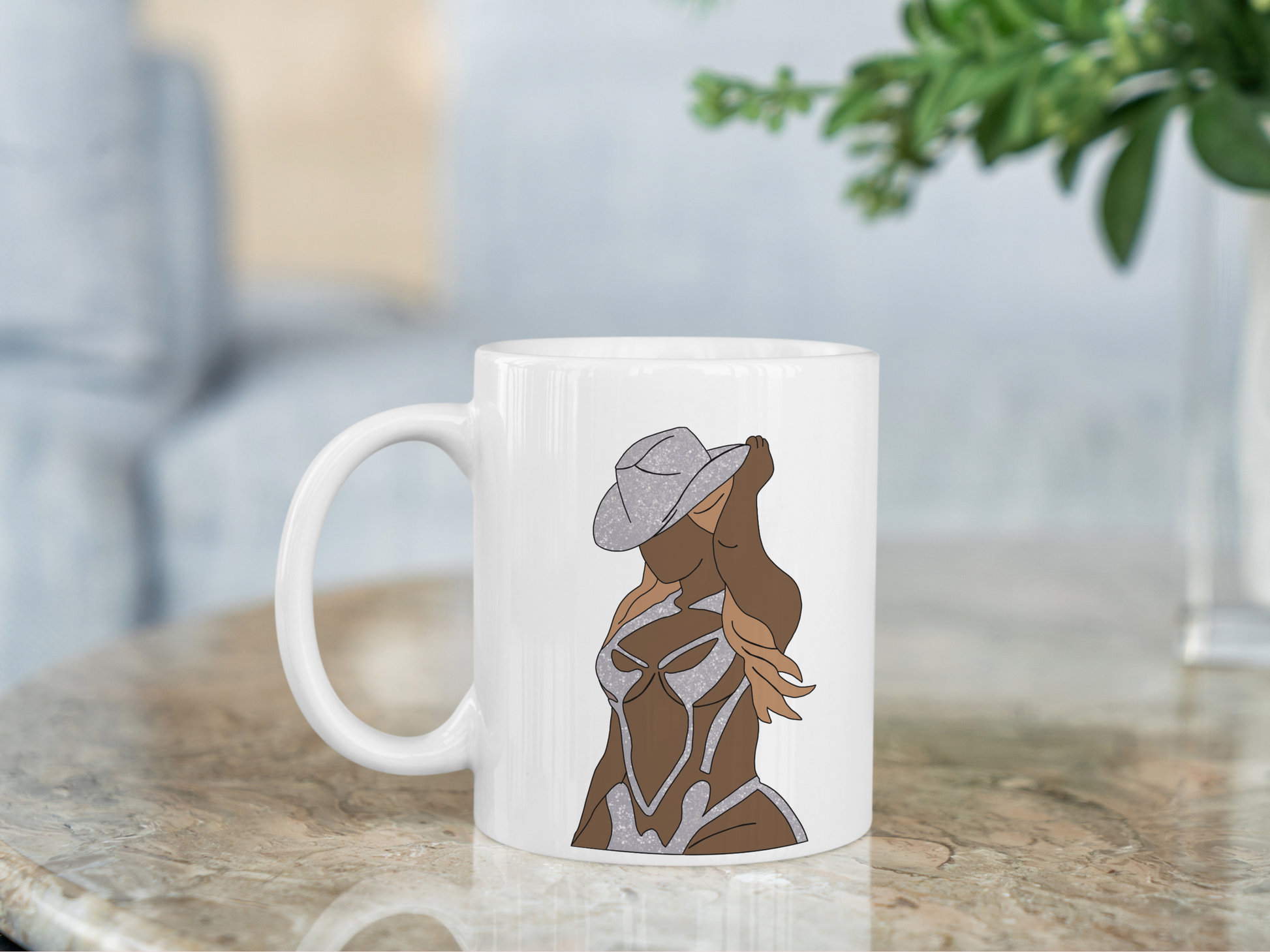 A white ceramic mug with a drawing of Beyonce on the front. This is a 10oz mug which is perfect for fans of Beyonce Renaissance Tour Concerts. Made and sold by Krissi's Creations.