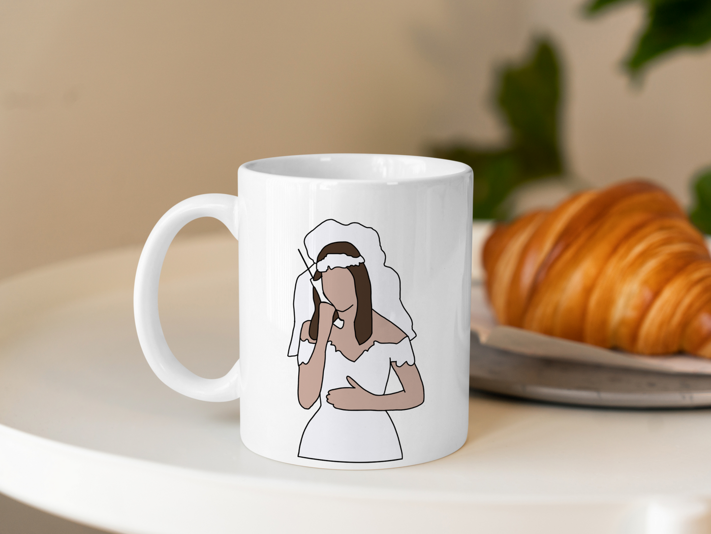 A white ceramic mug with a drawing of Rachel Green from Friends on the front. This is a 10oz mug which is perfect for fans of Friends, particularly the character Rachel. Made and sold by Krissi's Creations.