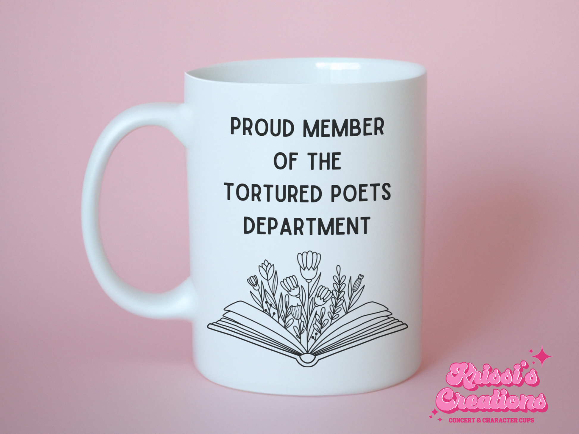 A white ceramic mug with a drawing of a book with flowers, above it is the text Proud member of the Tourtured Poets Department on the front. This is a 10oz mug which is perfect for fans of Taylor Swift. Made and sold by Krissi's Creations.