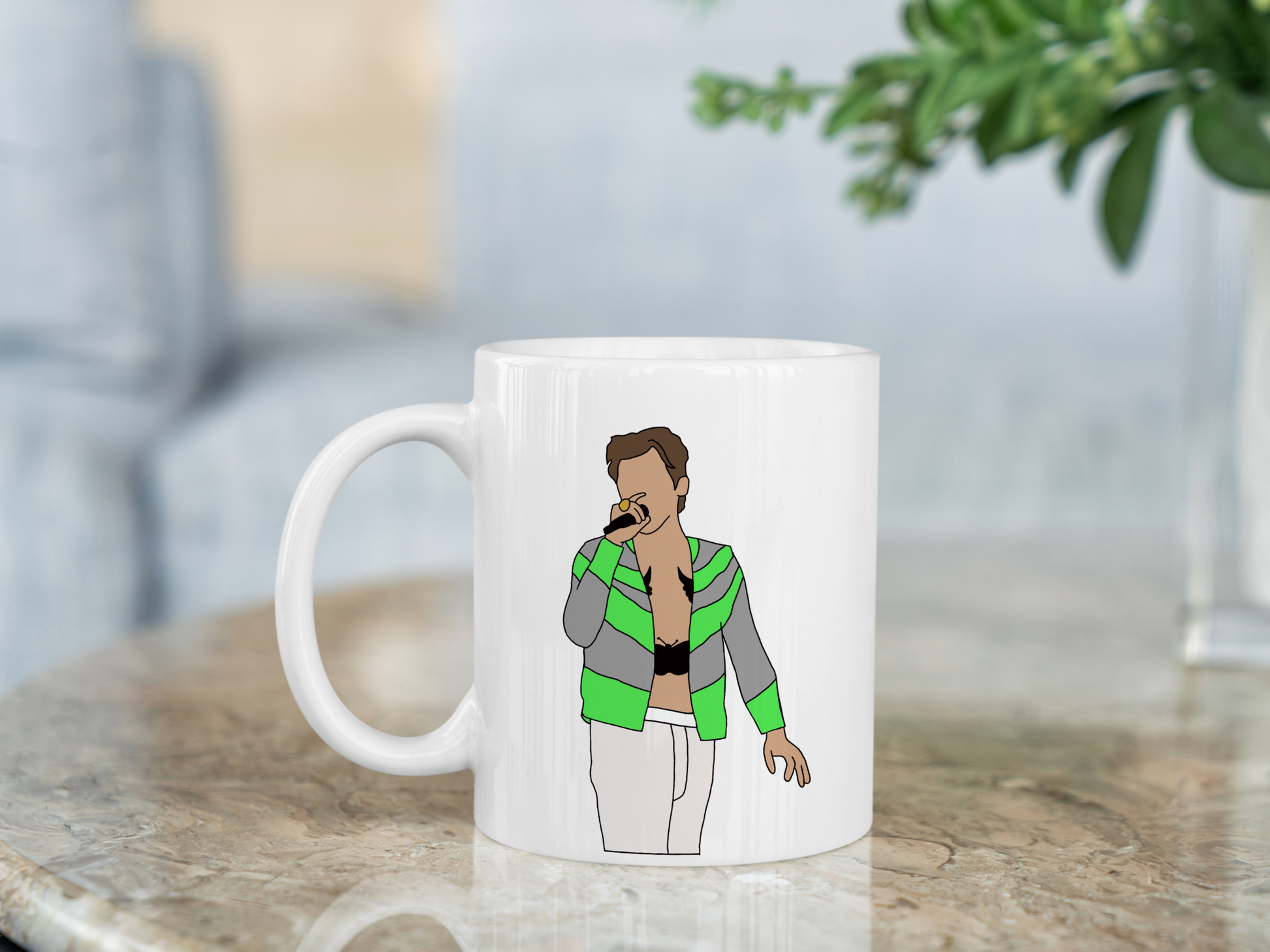 A white ceramic mug with a drawing of Harry Styles Slane Love On Tour Outfit on the front. This is a 10oz mug which is perfect for fans of Harry Styles Love on Tour Concert. Made and sold by Krissi's Creations.