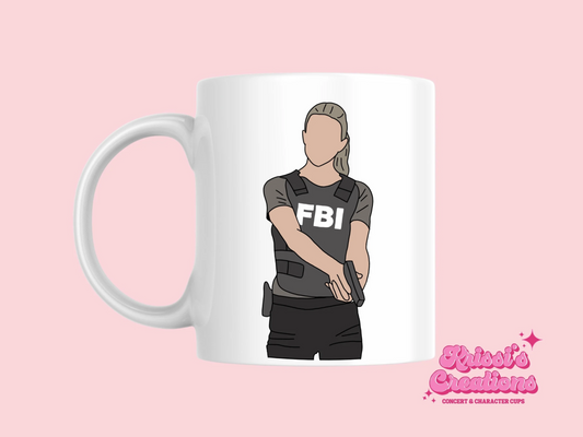 A white ceramic mug with a drawing of Jennifer Jareau from Criminal Minds on the front. This is a 10oz mug which is perfect for fans of Criminal Minds, particularly the character Jennifer Jareau. Made and sold by Krissi's Creations.