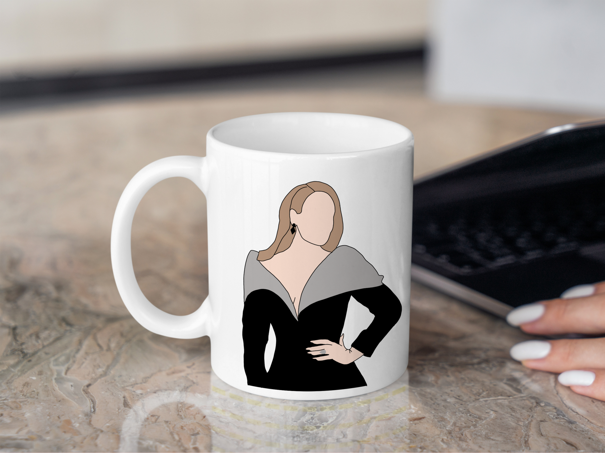 A white ceramic mug with a drawing of Adele on the front. This is a 10oz mug which is perfect for fans of Adele Vegas Residency Concerts. Made and sold by Krissi's Creations.