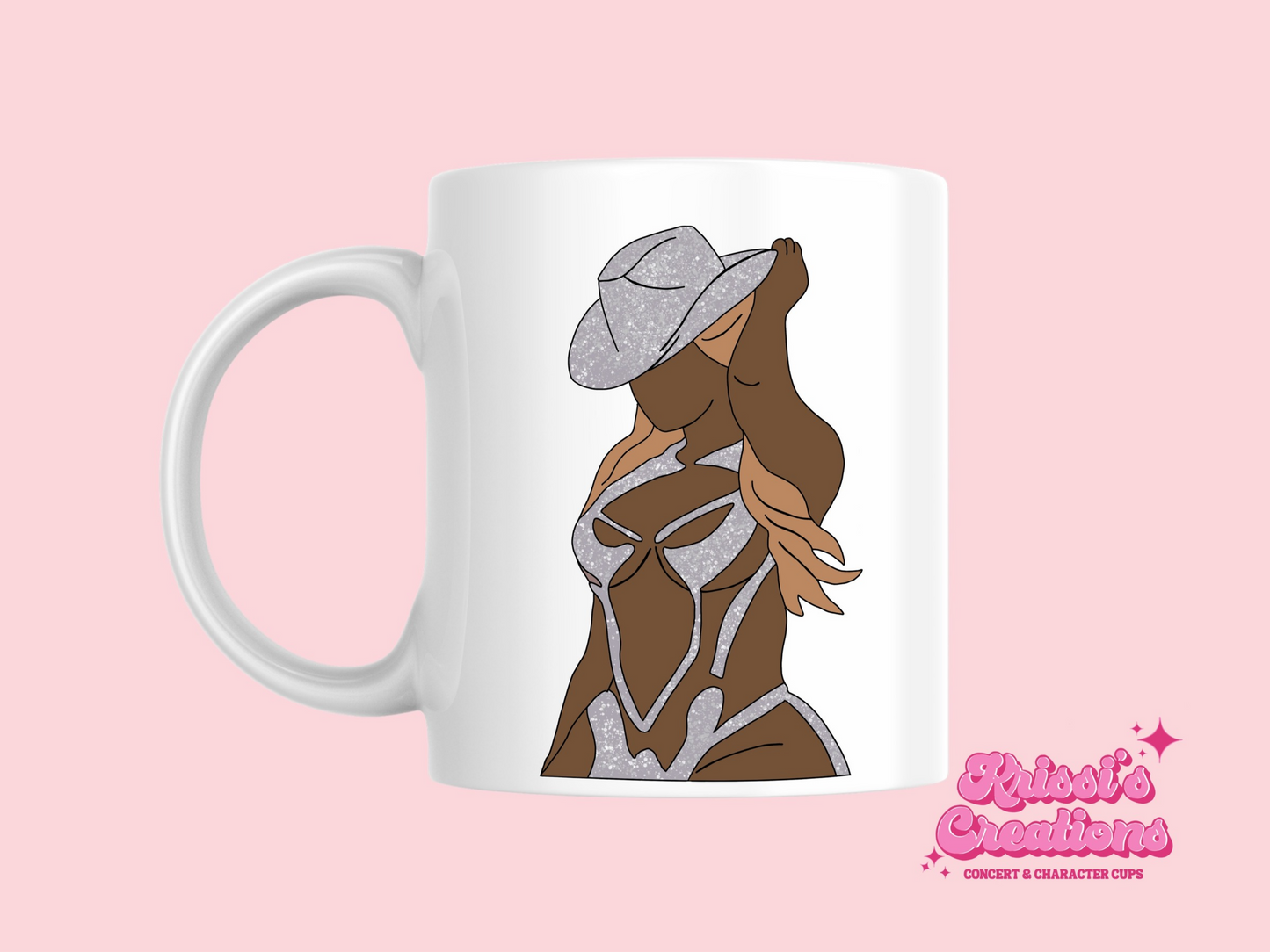 A white ceramic mug with a drawing of Beyonce on the front. This is a 10oz mug which is perfect for fans of Beyonce Renaissance Tour Concerts. Made and sold by Krissi's Creations.