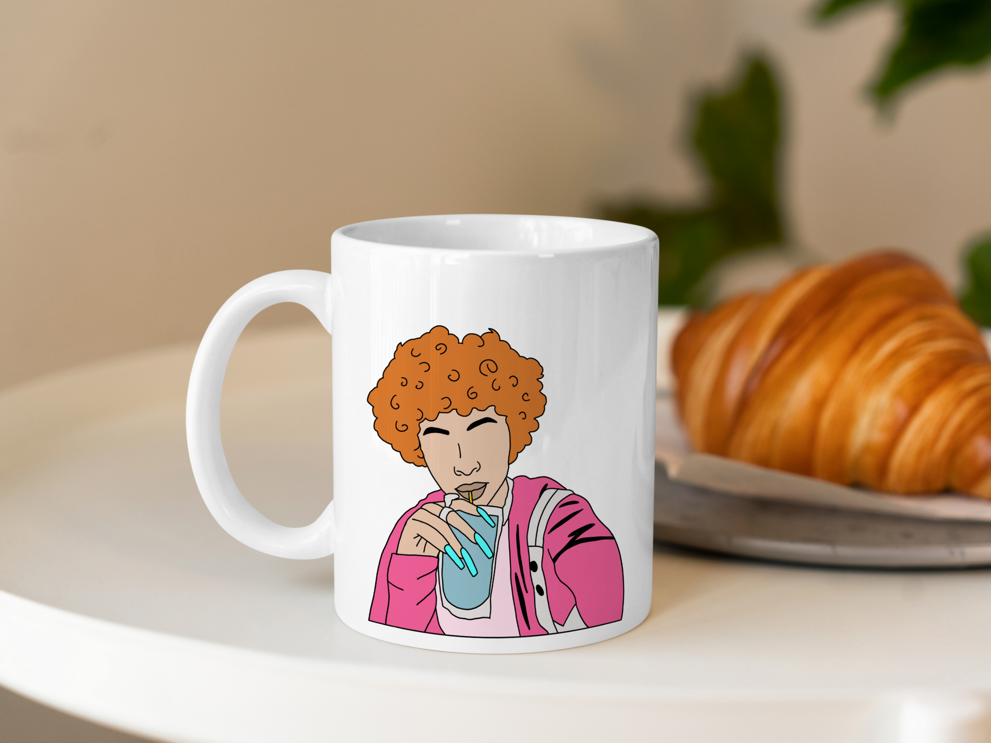 A white ceramic mug with a drawing of Ice Spice on the front. This is a 10oz mug which is perfect for fans of Ice Spice. Made and sold by Krissi's Creations.