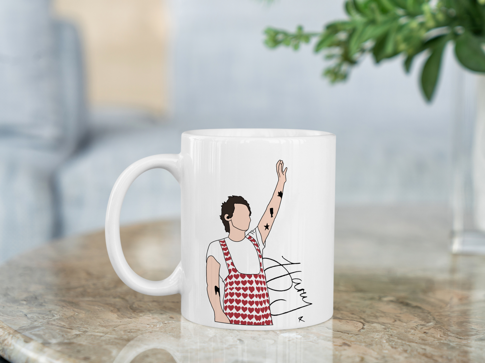 A white ceramic mug with a drawing of Harry Styles Wembley Love On Tour Outfit on the front. This is a 10oz mug which is perfect for fans of Harry Styles Love on Tour Concert. Made and sold by Krissi's Creations.