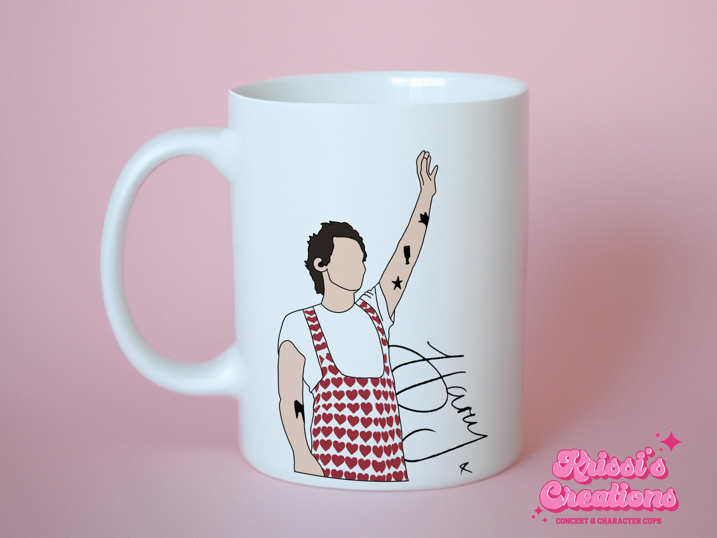 A white ceramic mug with a drawing of Harry Styles Wembley Love On Tour Outfit on the front. This is a 10oz mug which is perfect for fans of Harry Styles Love on Tour Concert. Made and sold by Krissi's Creations.