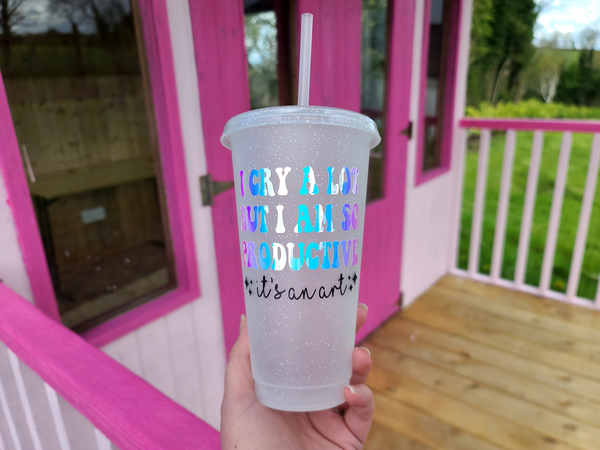 A Glitter tumbler with The Text I Cry A Lot But I am So Productive Lyrics From The Tortured Poets Department TTPD. This is a 24oz cup which is perfect for fans of Taylor Swift. Made and sold by Krissi's Creations.