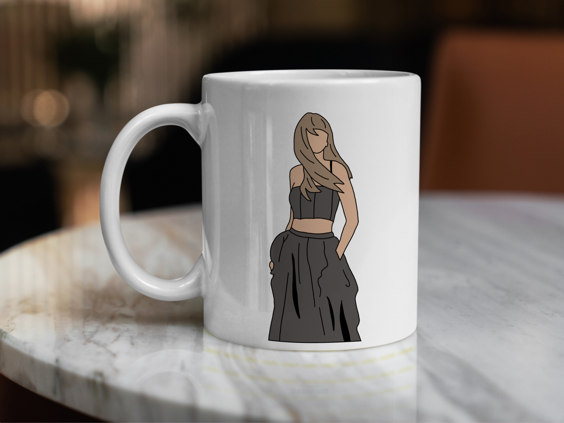 A white ceramic mug with a drawing of Taylor Swift from her Tortured Poets Department Era on the front. This is a 10oz mug which is perfect for fans of Era's Tour, particularly the TTPD Album. Made and sold by Krissi's Creations.