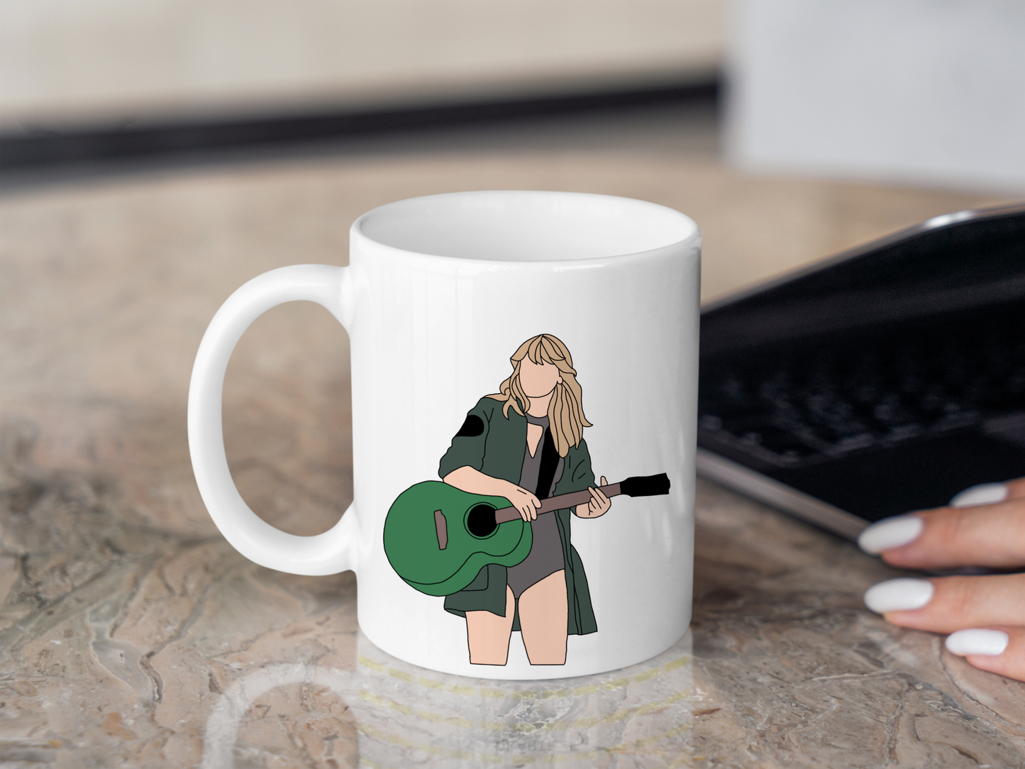 A white ceramic mug with a drawing of Taylor Swift from her Reputation Era on the front. This is a 10oz mug which is perfect for fans of Era's Tour, particularly the Reputation Album. Made and sold by Krissi's Creations.