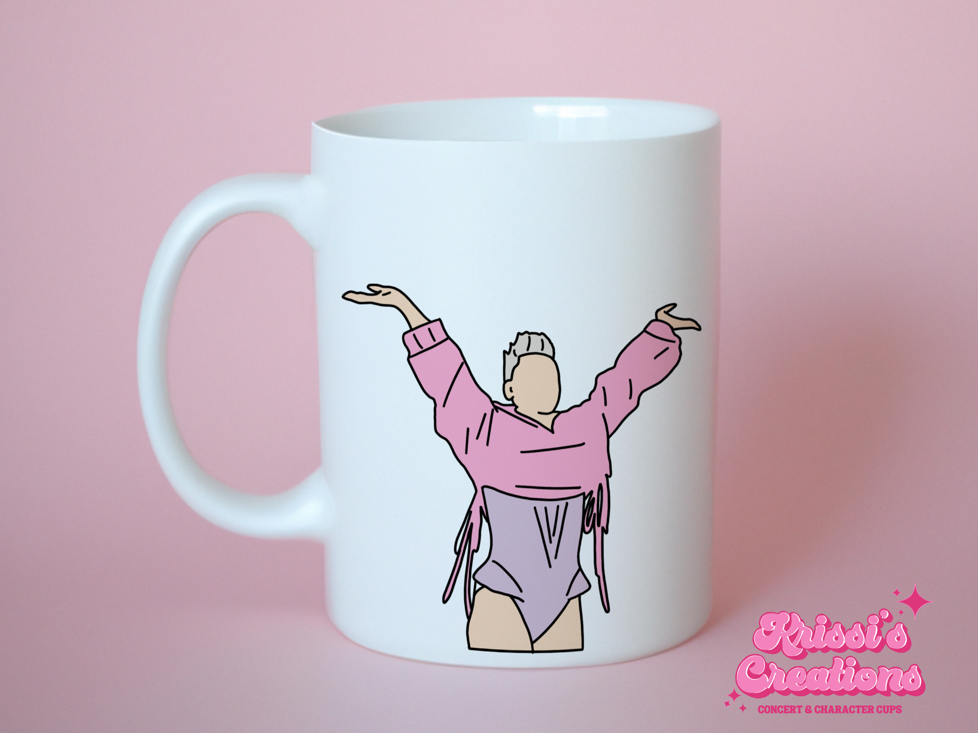 A white ceramic mug with a drawing of P!NK from her Summer Carnival 2024 on the front. This is a 10oz mug which is perfect for fans of Pink, particularly the Concert. Made and sold by Krissi's Creations.