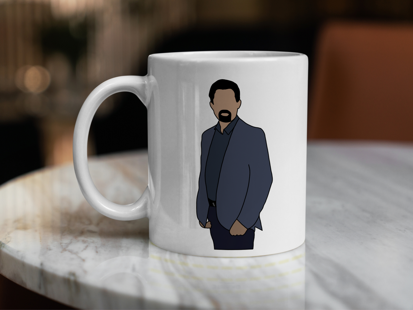 A white ceramic mug with a drawing of David Rossi from Criminal Minds on the front. This is a 10oz mug which is perfect for fans of Criminal Minds, particularly the character David Rossi. Made and sold by Krissi's Creations.