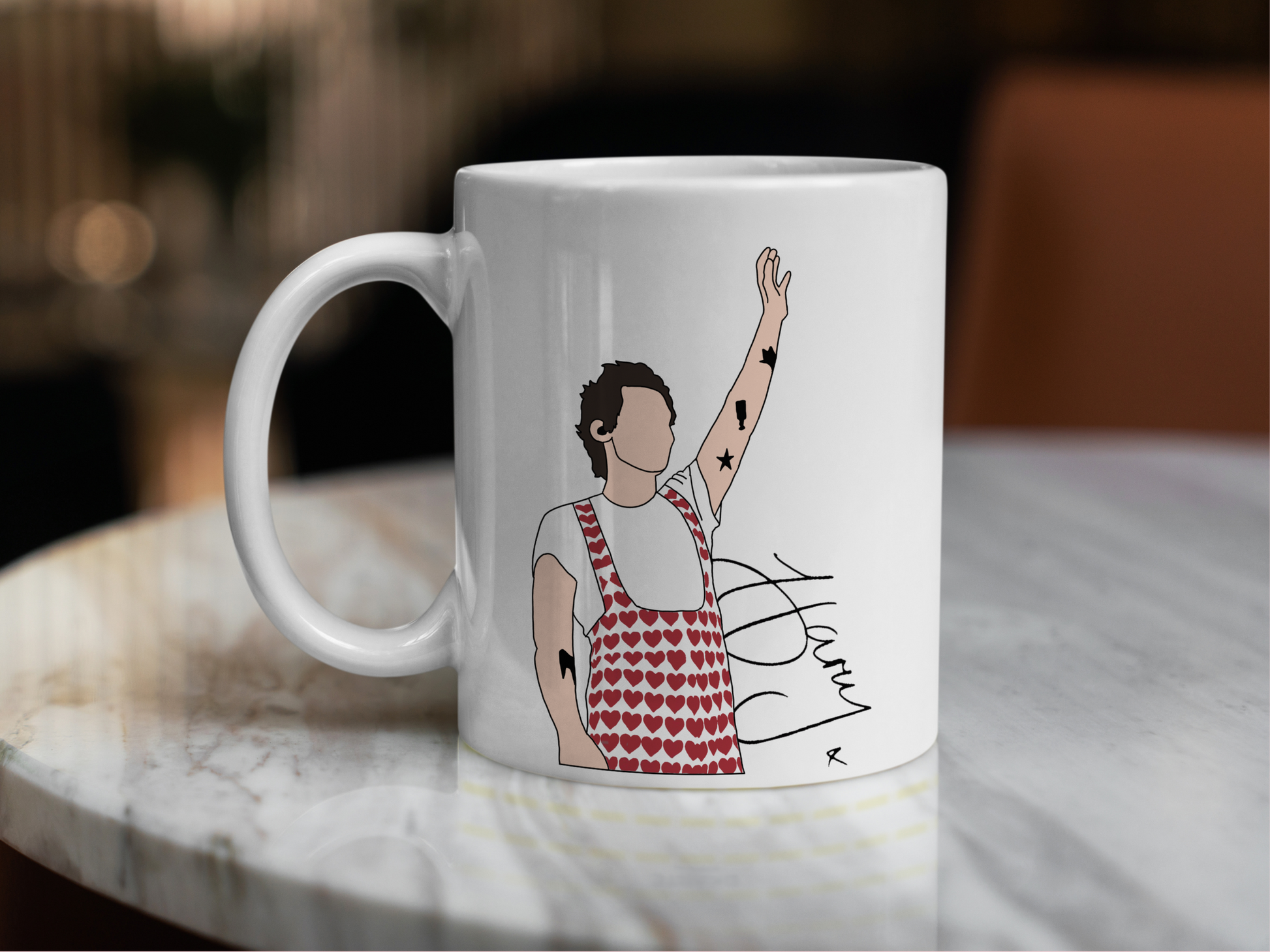 A white ceramic mug with a drawing of Harry Styles Wembley Love On Tour Outfit on the front. This is a 10oz mug which is perfect for fans of Harry Styles Love on Tour Concert. Made and sold by Krissi's Creations.