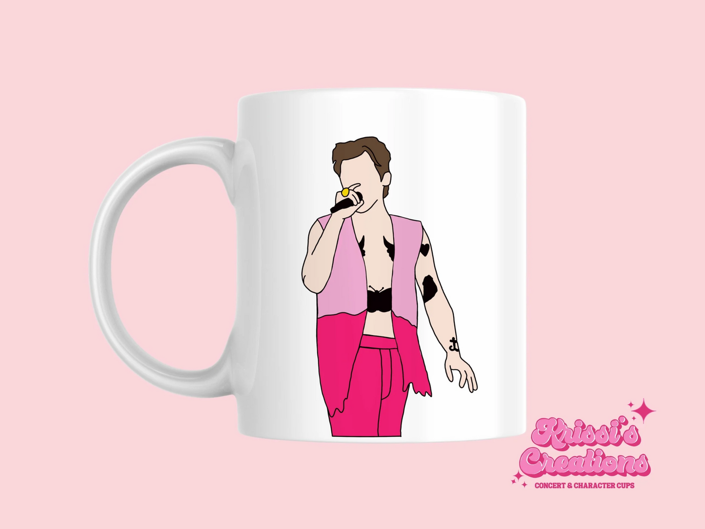 A white ceramic mug with a drawing of Harry Styles Edinburgh Night 2 Love On Tour Outfit on the front. This is a 10oz mug which is perfect for fans of Harry Styles Love on Tour Concert. Made and sold by Krissi's Creations.