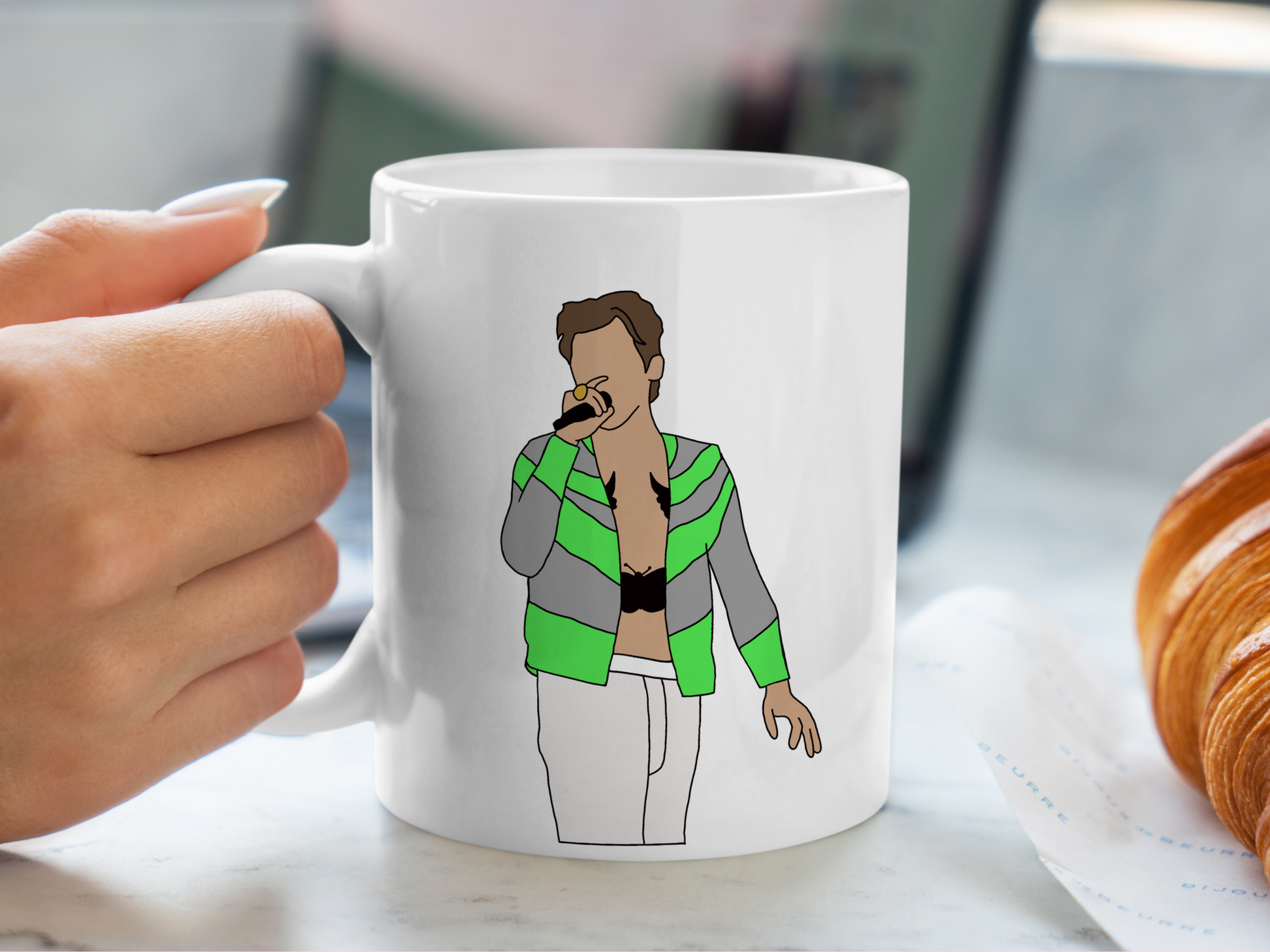 A white ceramic mug with a drawing of Harry Styles Slane Love On Tour Outfit on the front. This is a 10oz mug which is perfect for fans of Harry Styles Love on Tour Concert. Made and sold by Krissi's Creations.