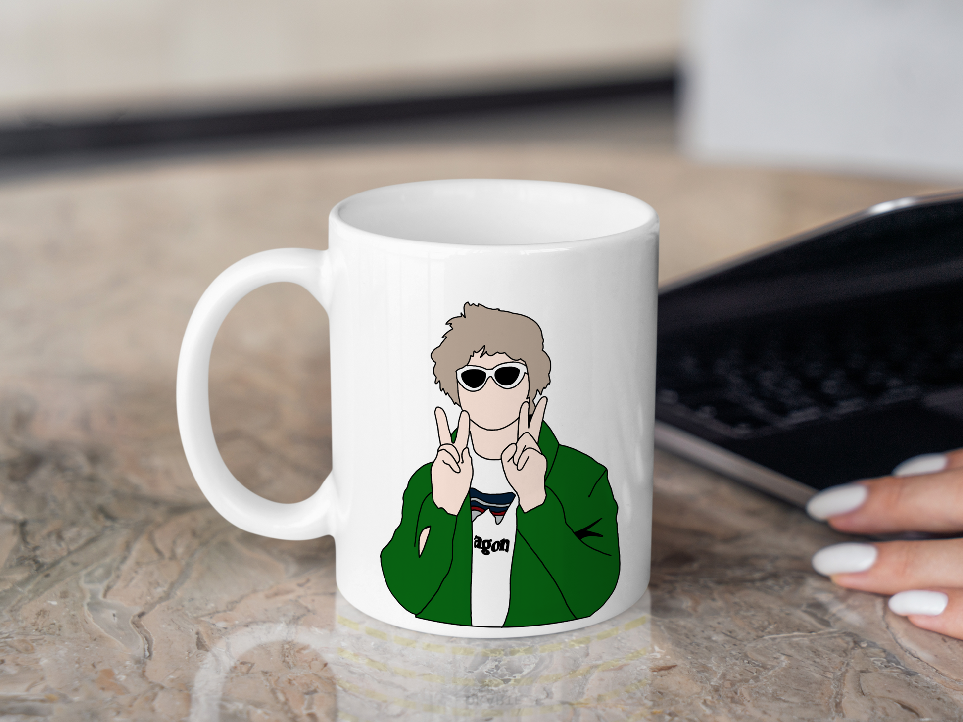 A white ceramic mug with a drawing of Lewis Capaldi on the front. This is a 10oz mug which is perfect for fans of Lewis Capaldi Concerts. Made and sold by Krissi's Creations.