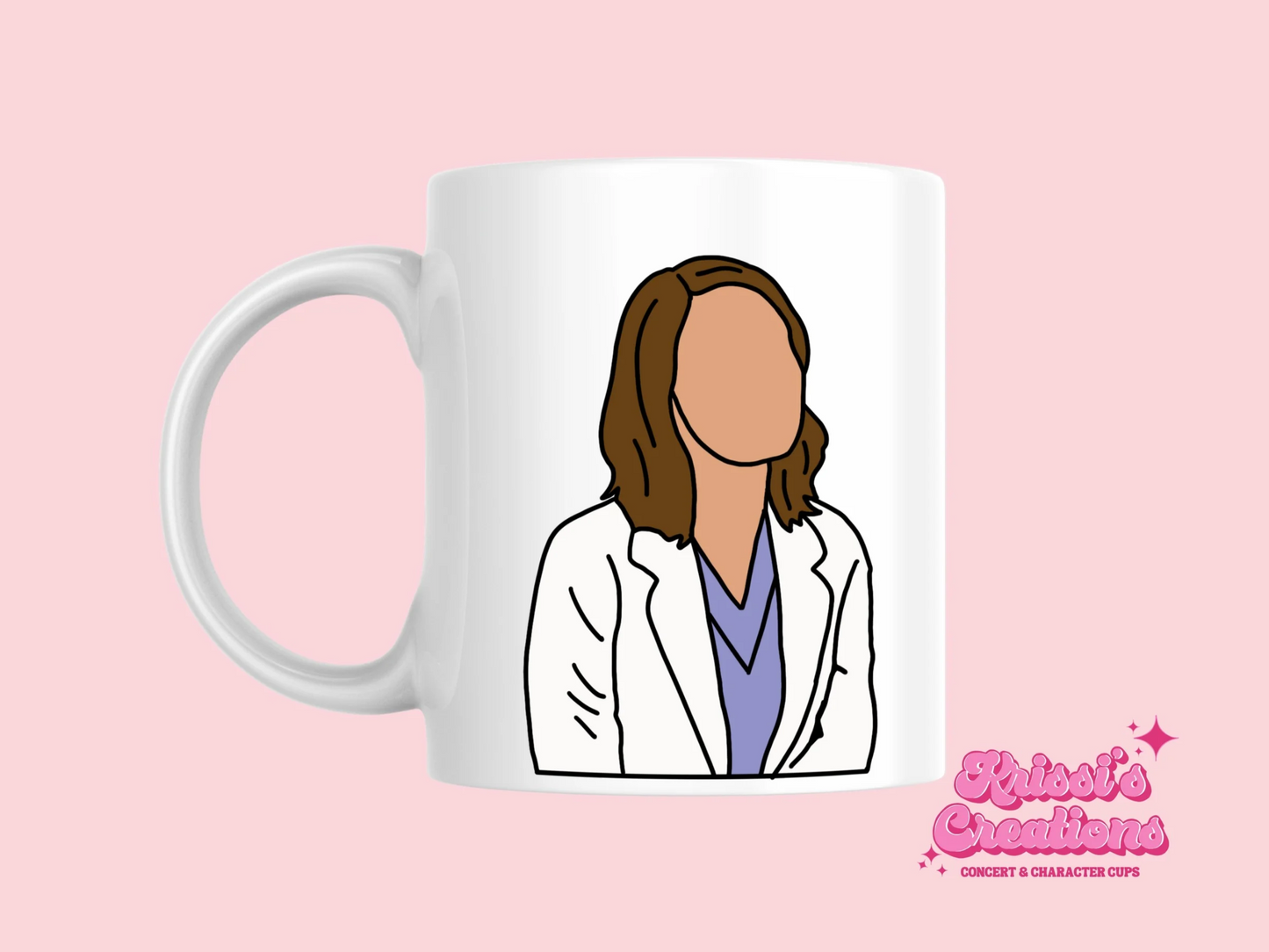 A white ceramic mug with a drawing of Jo Wilson from Grey's Anatomy on the front. This is a 10oz mug which is perfect for fans of Grey's Anatomy, particularly the character Jo Wilson. Made and sold by Krissi's Creations.