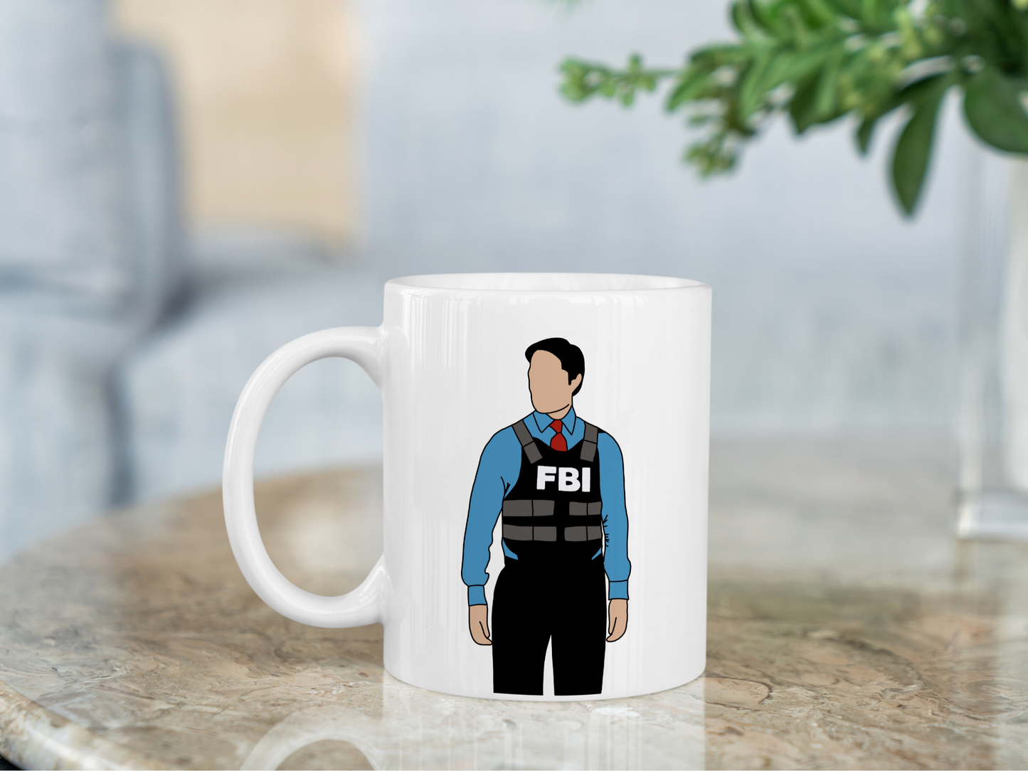 A white ceramic mug with a drawing of Aaron Hotchner from Criminal Minds on the front. This is a 10oz mug which is perfect for fans of Criminal Minds, particularly the character Aaron Hotchner. Made and sold by Krissi's Creations.