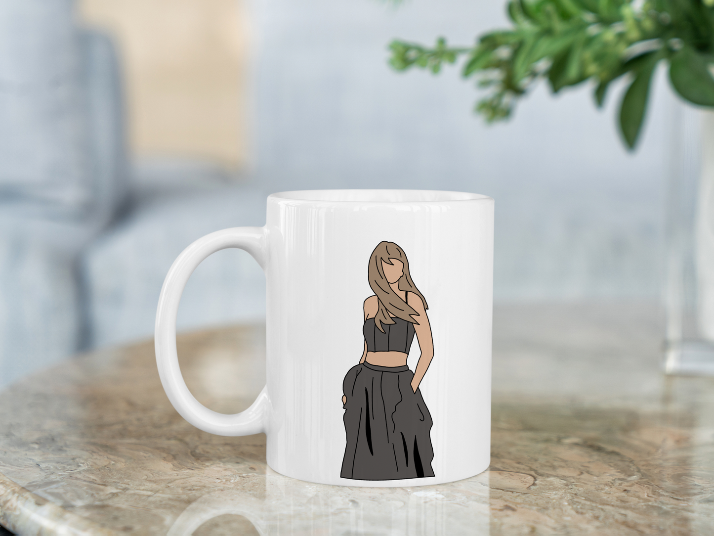 A white ceramic mug with a drawing of Taylor Swift from her Tortured Poets Department Era on the front. This is a 10oz mug which is perfect for fans of Era's Tour, particularly the TTPD Album. Made and sold by Krissi's Creations.