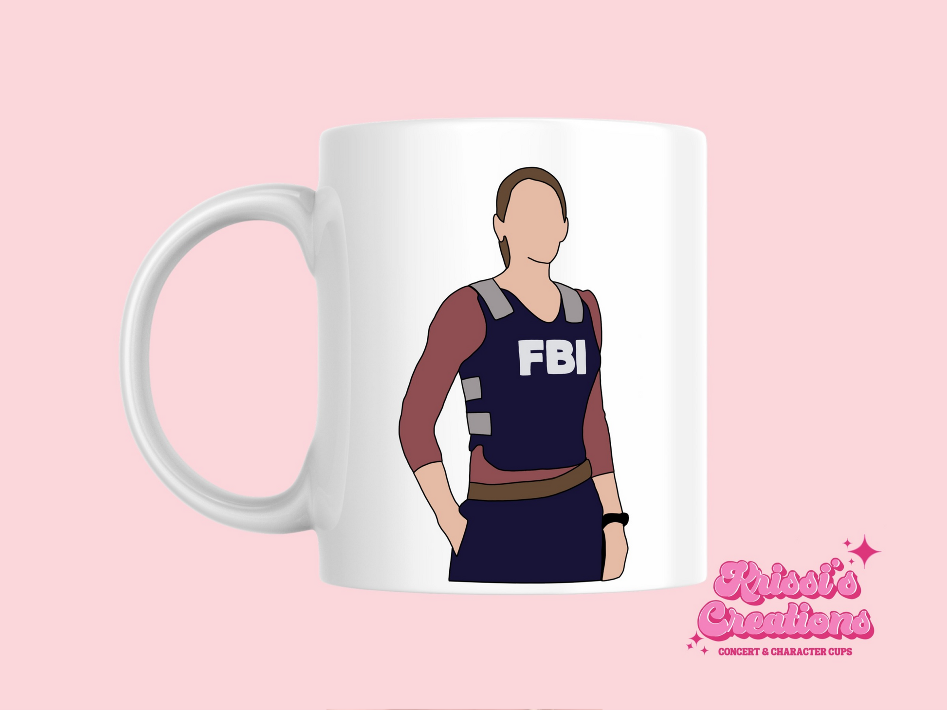 A white ceramic mug with a drawing of Emily Prentiss from Criminal Minds on the front. This is a 10oz mug which is perfect for fans of Criminal Minds, particularly the character Emily Prentiss. Made and sold by Krissi's Creations.