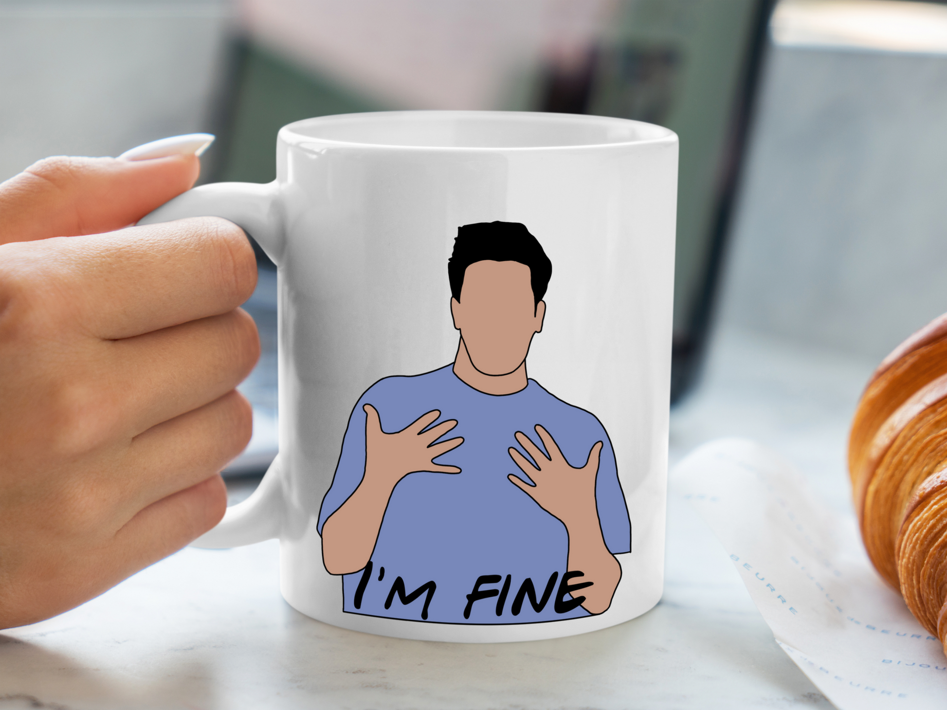 A white ceramic mug with a drawing of Ross Gellar from Friends on the front. This is a 10oz mug which is perfect for fans of Friends, particularly the character Ross. Made and sold by Krissi's Creations.